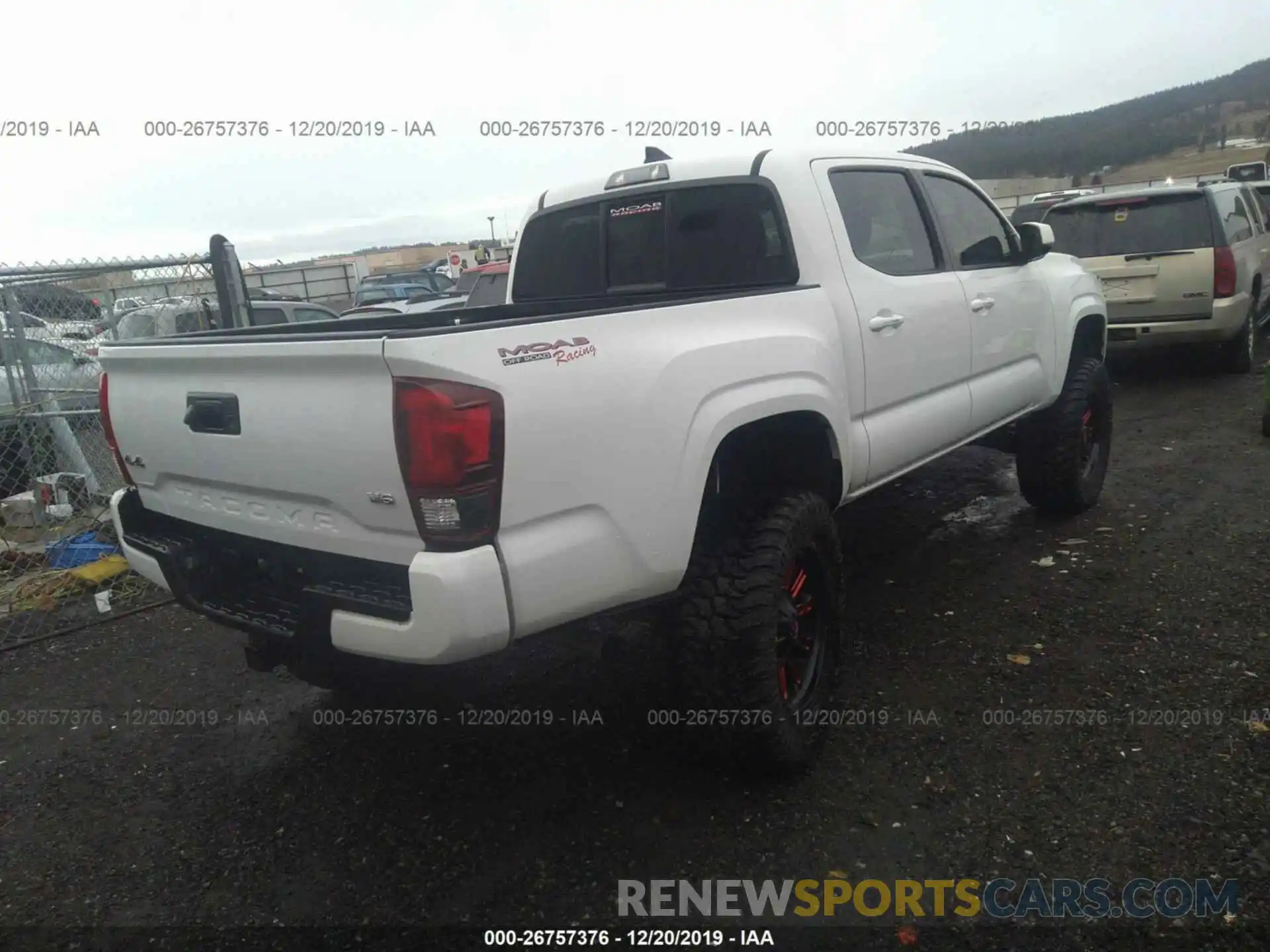 4 Photograph of a damaged car 3TMCZ5AN0KM265205 TOYOTA TACOMA 2019