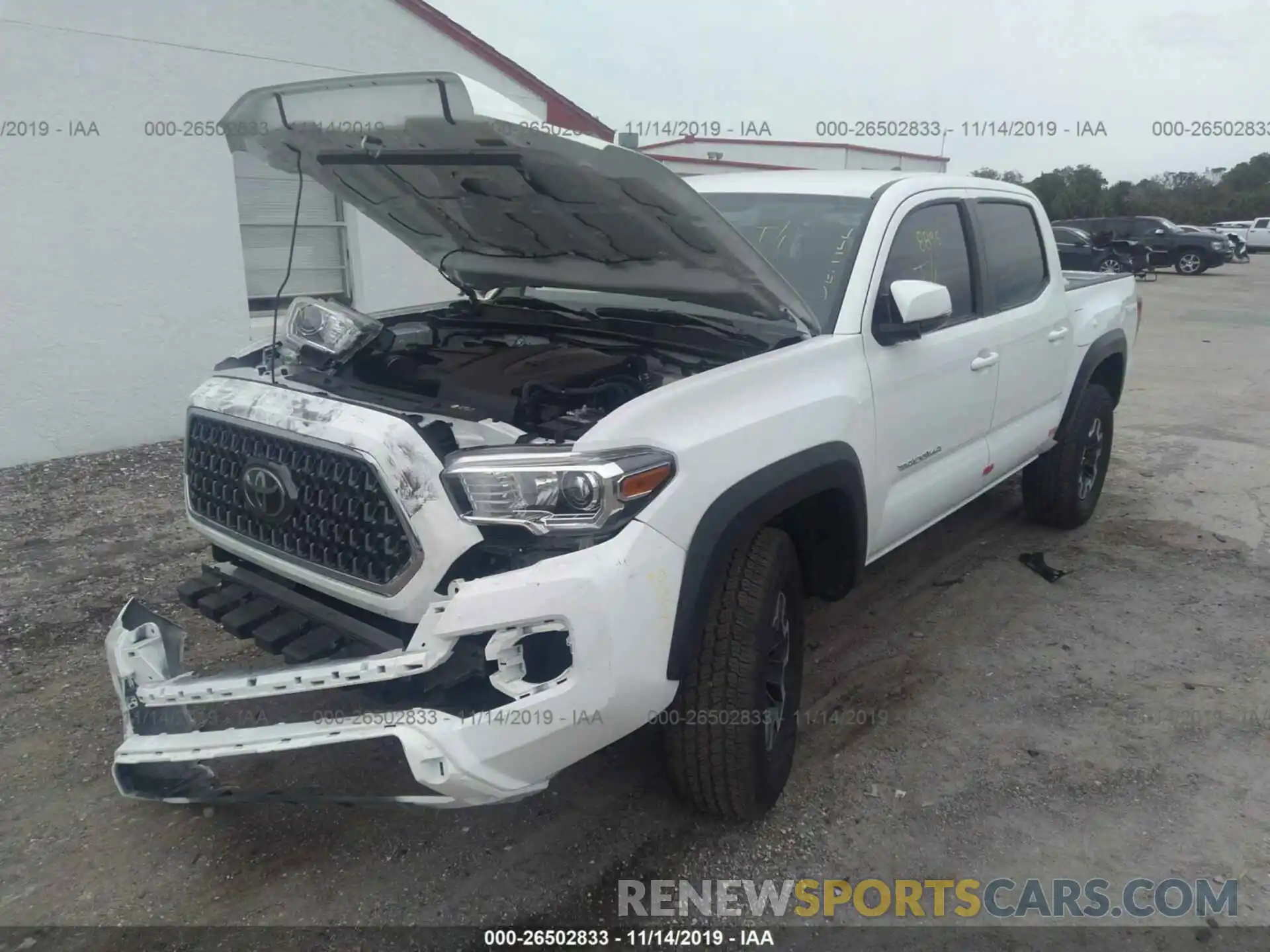 2 Photograph of a damaged car 3TMCZ5AN0KM266693 TOYOTA TACOMA 2019