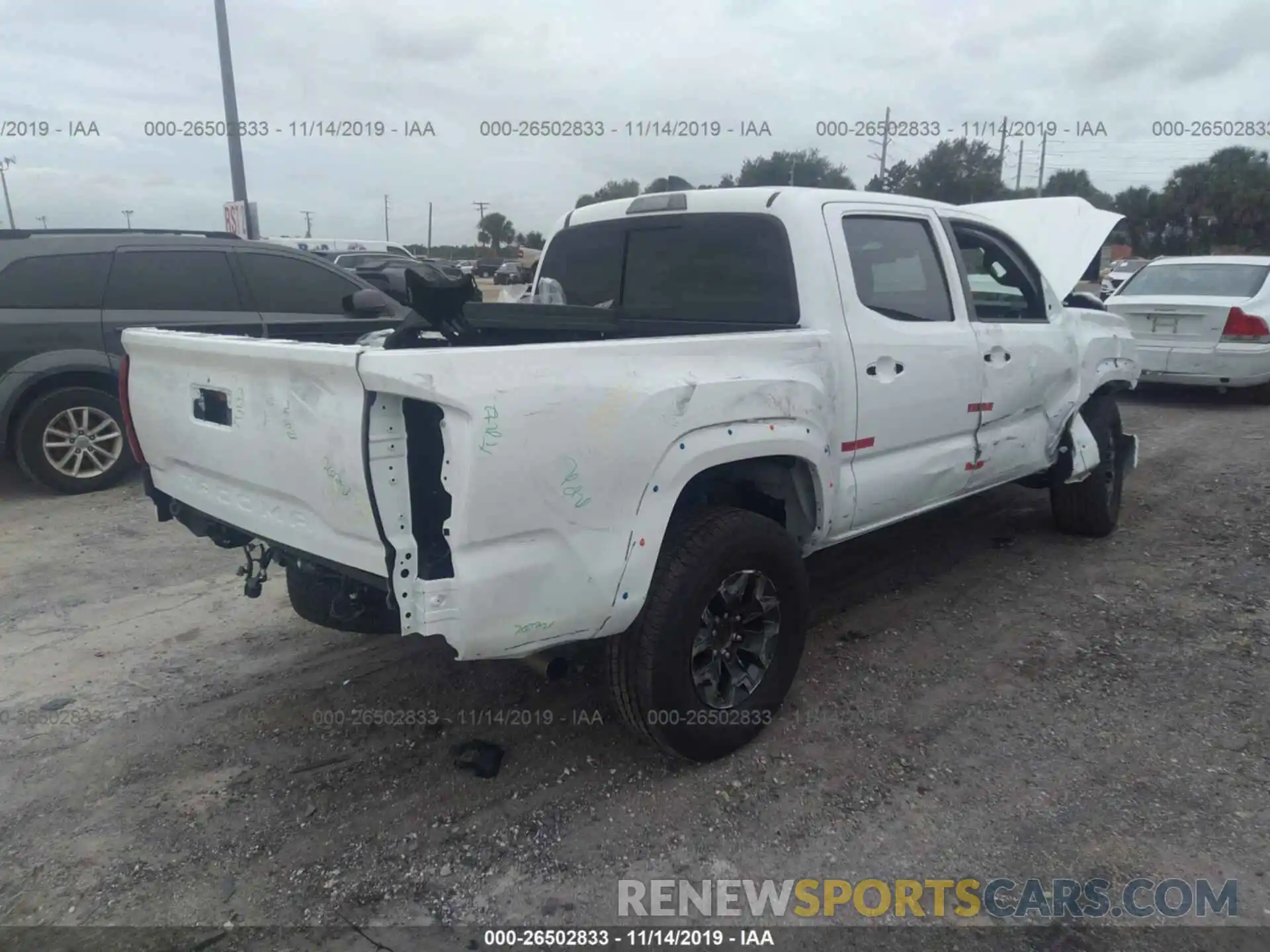 4 Photograph of a damaged car 3TMCZ5AN0KM266693 TOYOTA TACOMA 2019