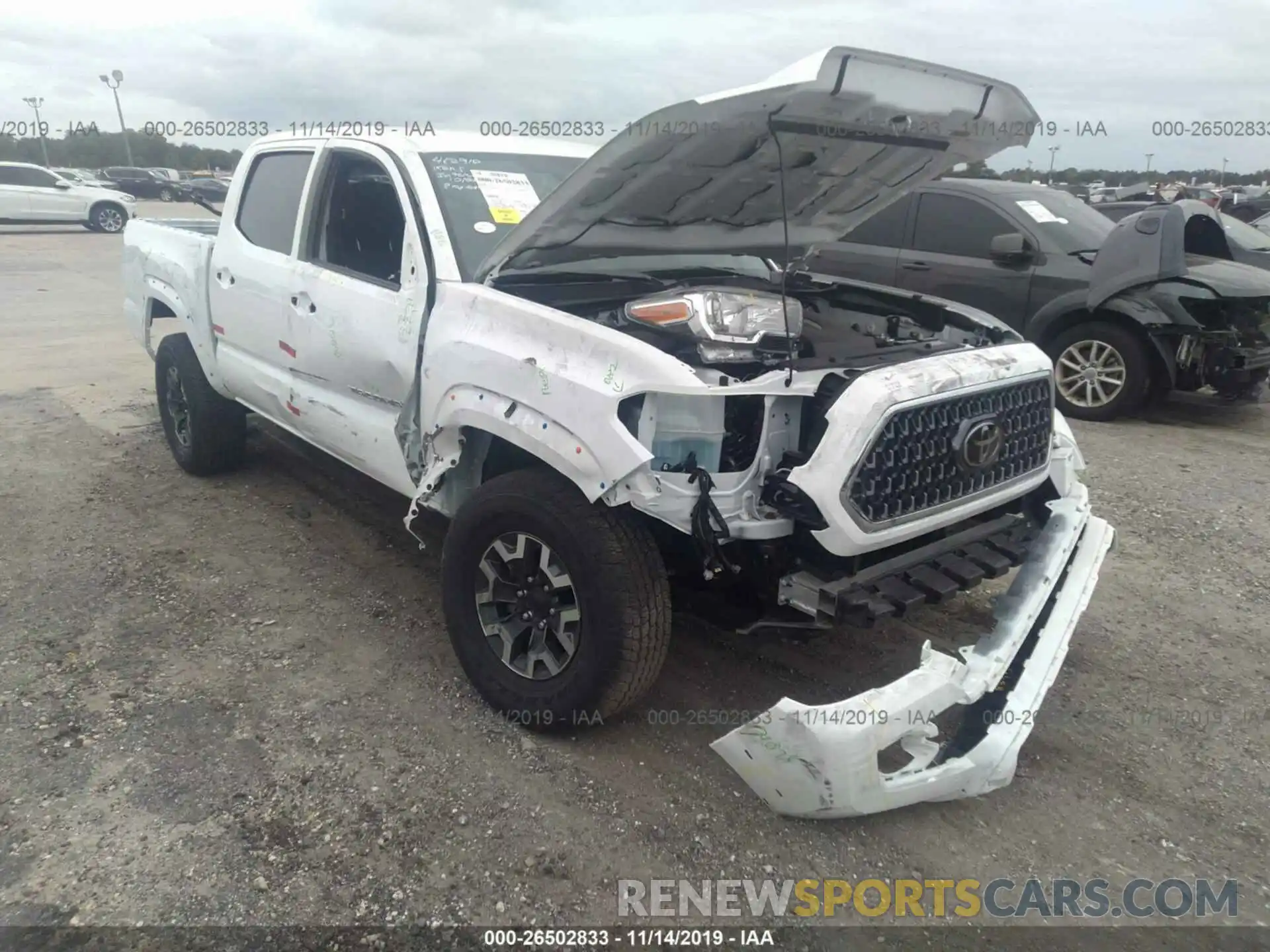 6 Photograph of a damaged car 3TMCZ5AN0KM266693 TOYOTA TACOMA 2019