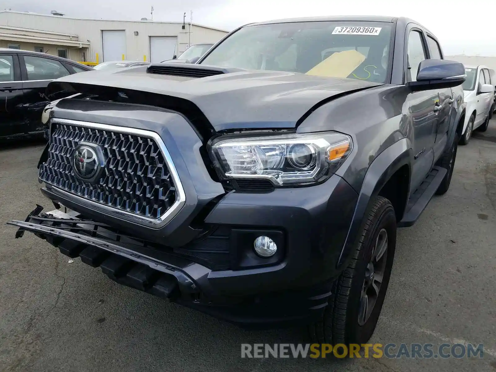 2 Photograph of a damaged car 3TMCZ5AN0KM266998 TOYOTA TACOMA 2019