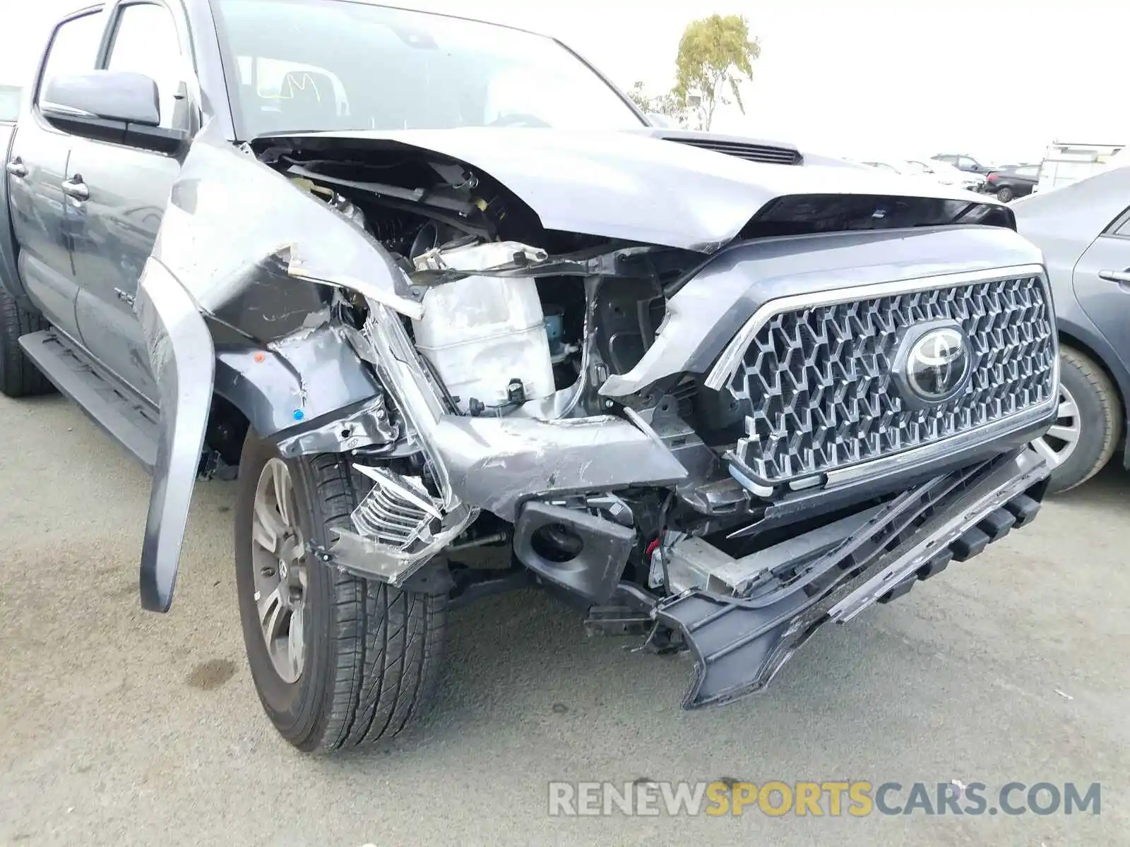 9 Photograph of a damaged car 3TMCZ5AN0KM266998 TOYOTA TACOMA 2019