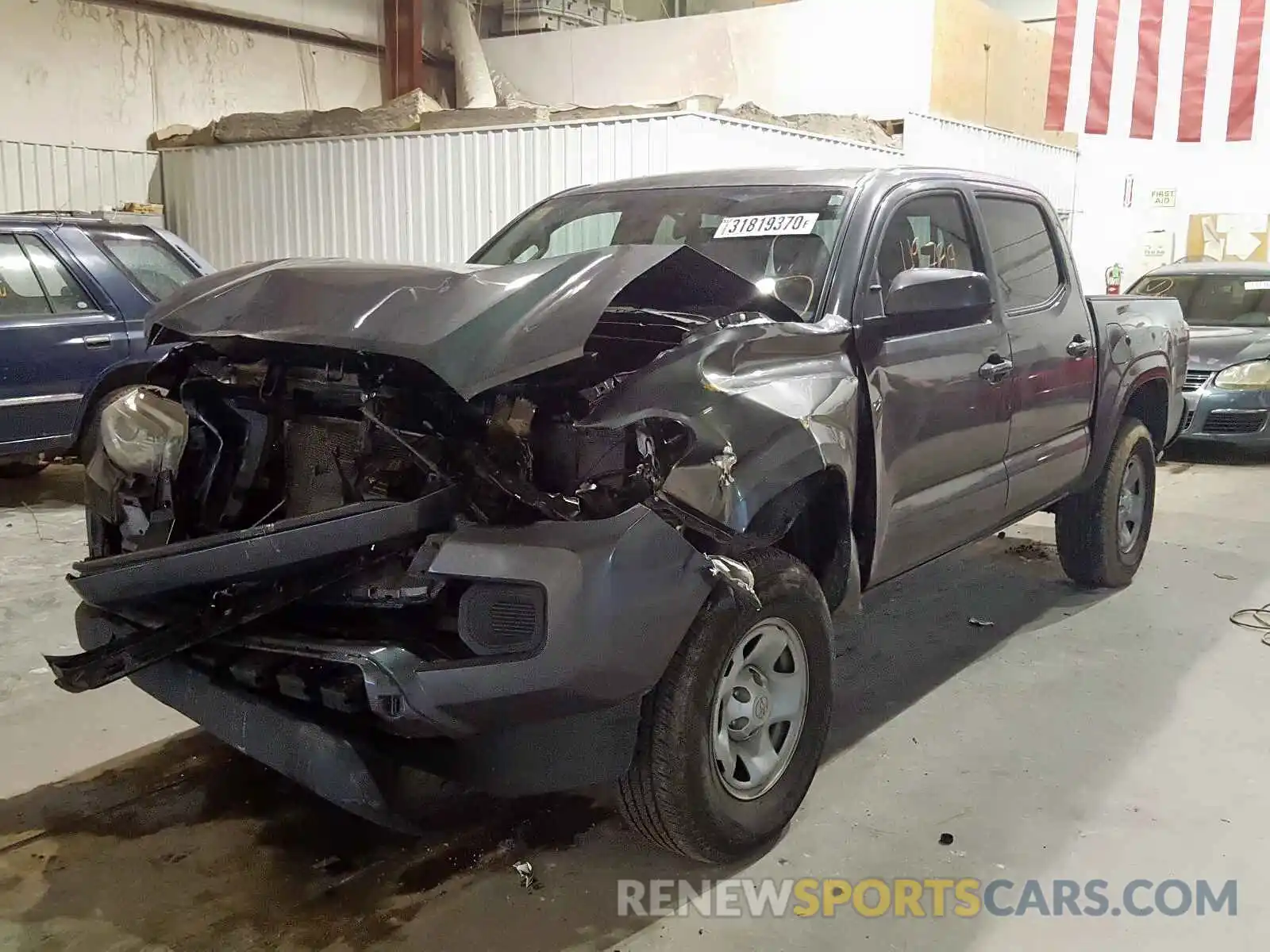 2 Photograph of a damaged car 3TMCZ5AN0KM267665 TOYOTA TACOMA 2019