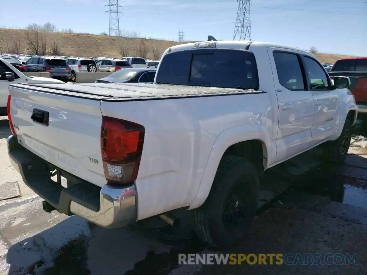 4 Photograph of a damaged car 3TMCZ5AN0KM271537 TOYOTA TACOMA 2019