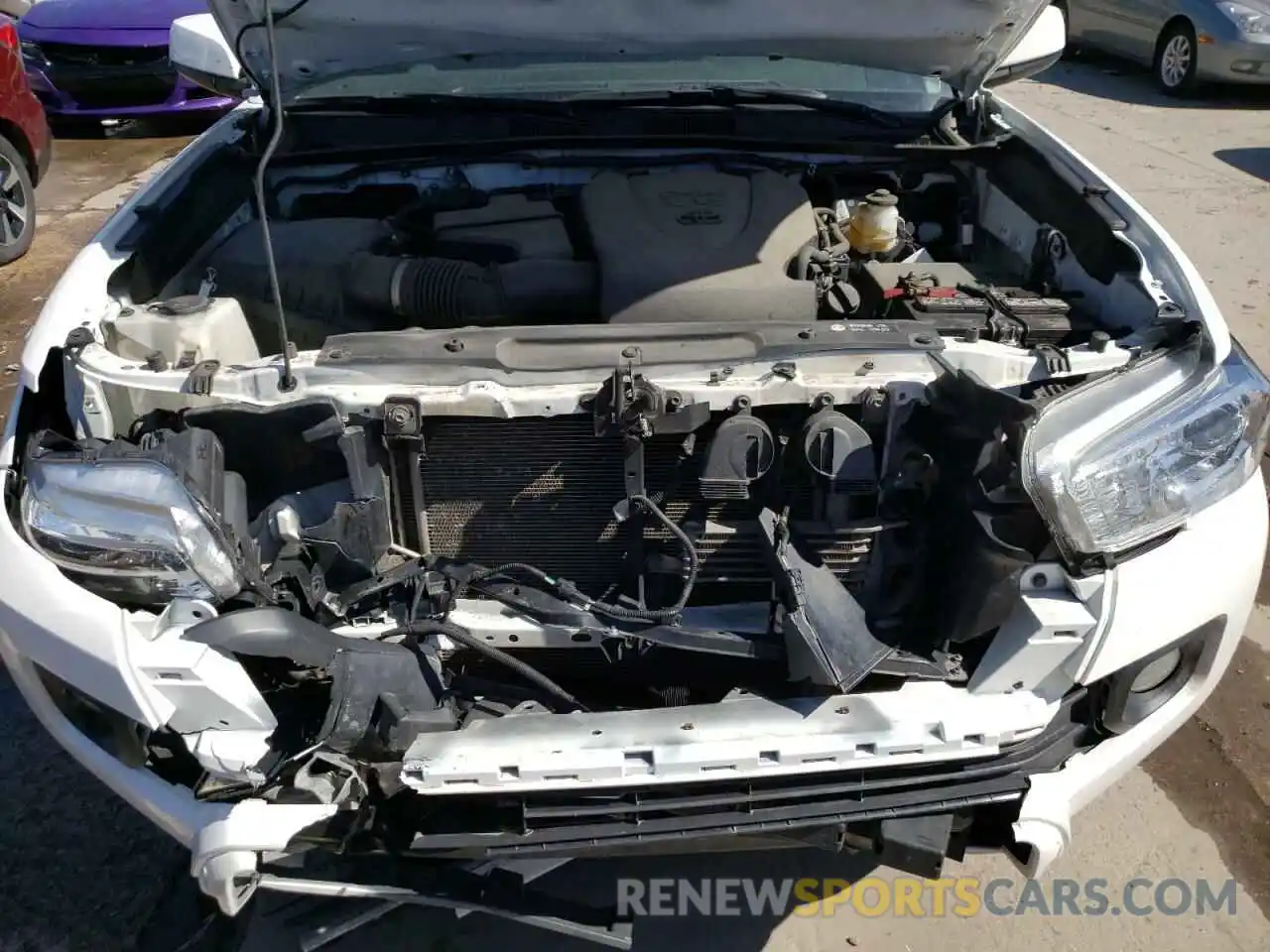 7 Photograph of a damaged car 3TMCZ5AN0KM271537 TOYOTA TACOMA 2019