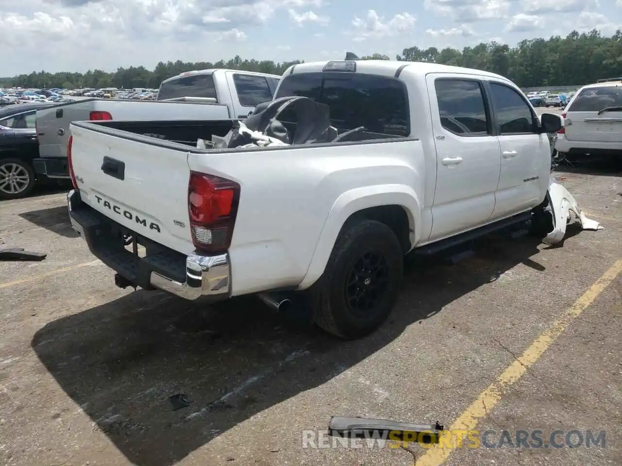 4 Photograph of a damaged car 3TMCZ5AN0KM271540 TOYOTA TACOMA 2019