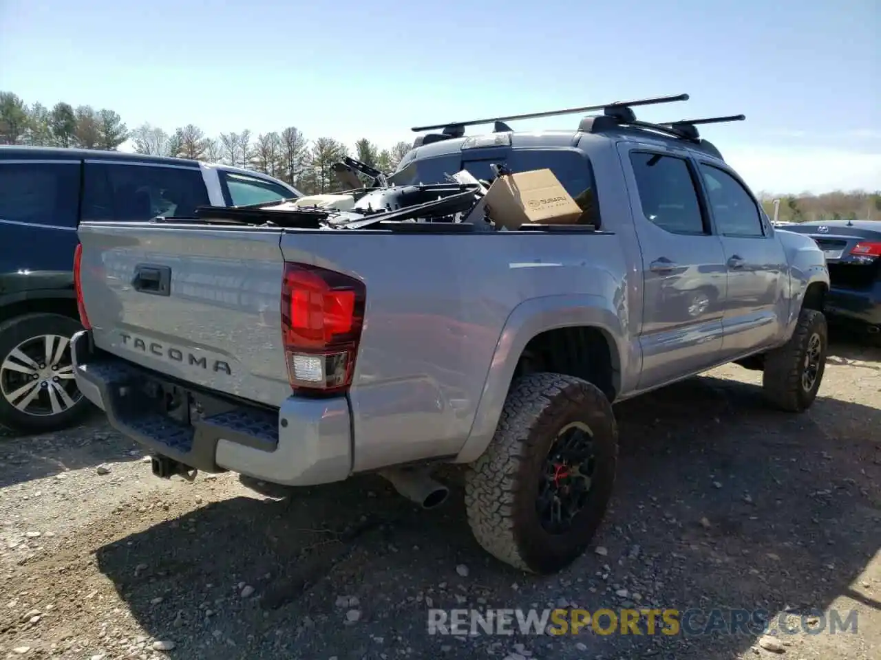 4 Photograph of a damaged car 3TMCZ5AN0KM271666 TOYOTA TACOMA 2019