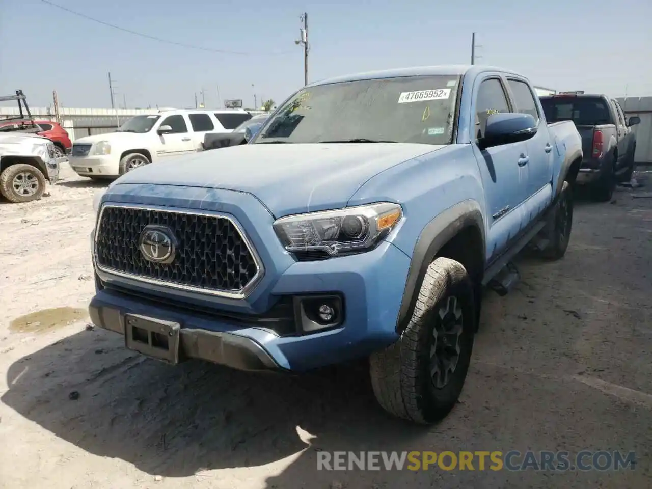 2 Photograph of a damaged car 3TMCZ5AN0KM272817 TOYOTA TACOMA 2019