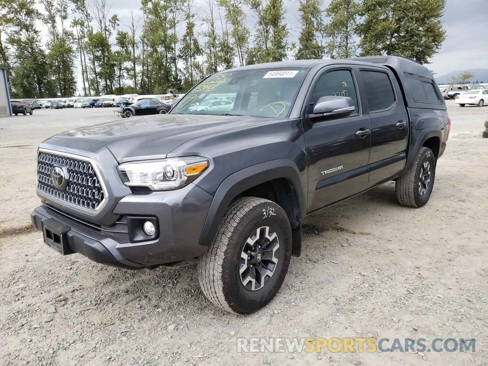 2 Photograph of a damaged car 3TMCZ5AN0KM275989 TOYOTA TACOMA 2019