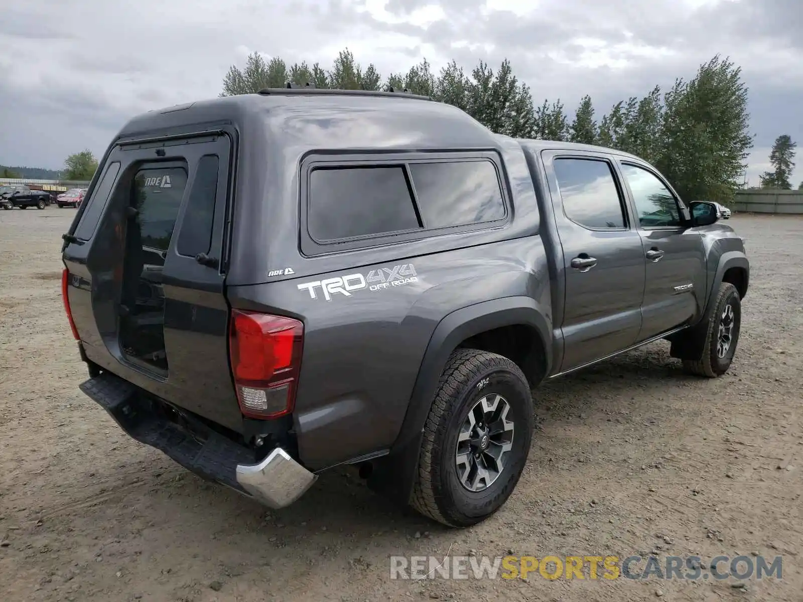 4 Photograph of a damaged car 3TMCZ5AN0KM275989 TOYOTA TACOMA 2019