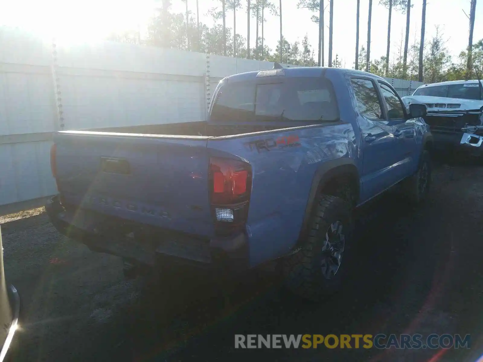 4 Photograph of a damaged car 3TMCZ5AN0KM276947 TOYOTA TACOMA 2019