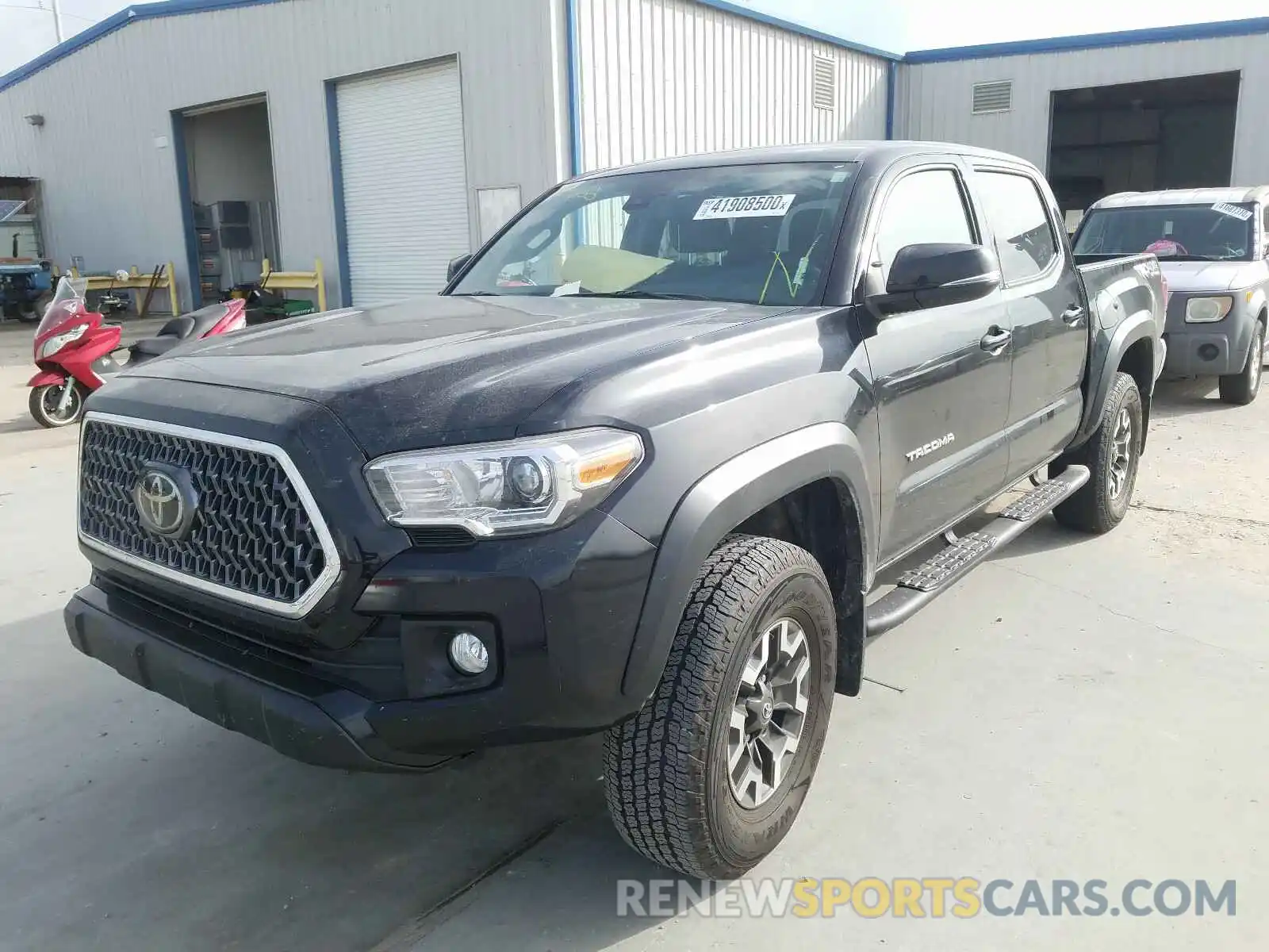 2 Photograph of a damaged car 3TMCZ5AN0KM279752 TOYOTA TACOMA 2019