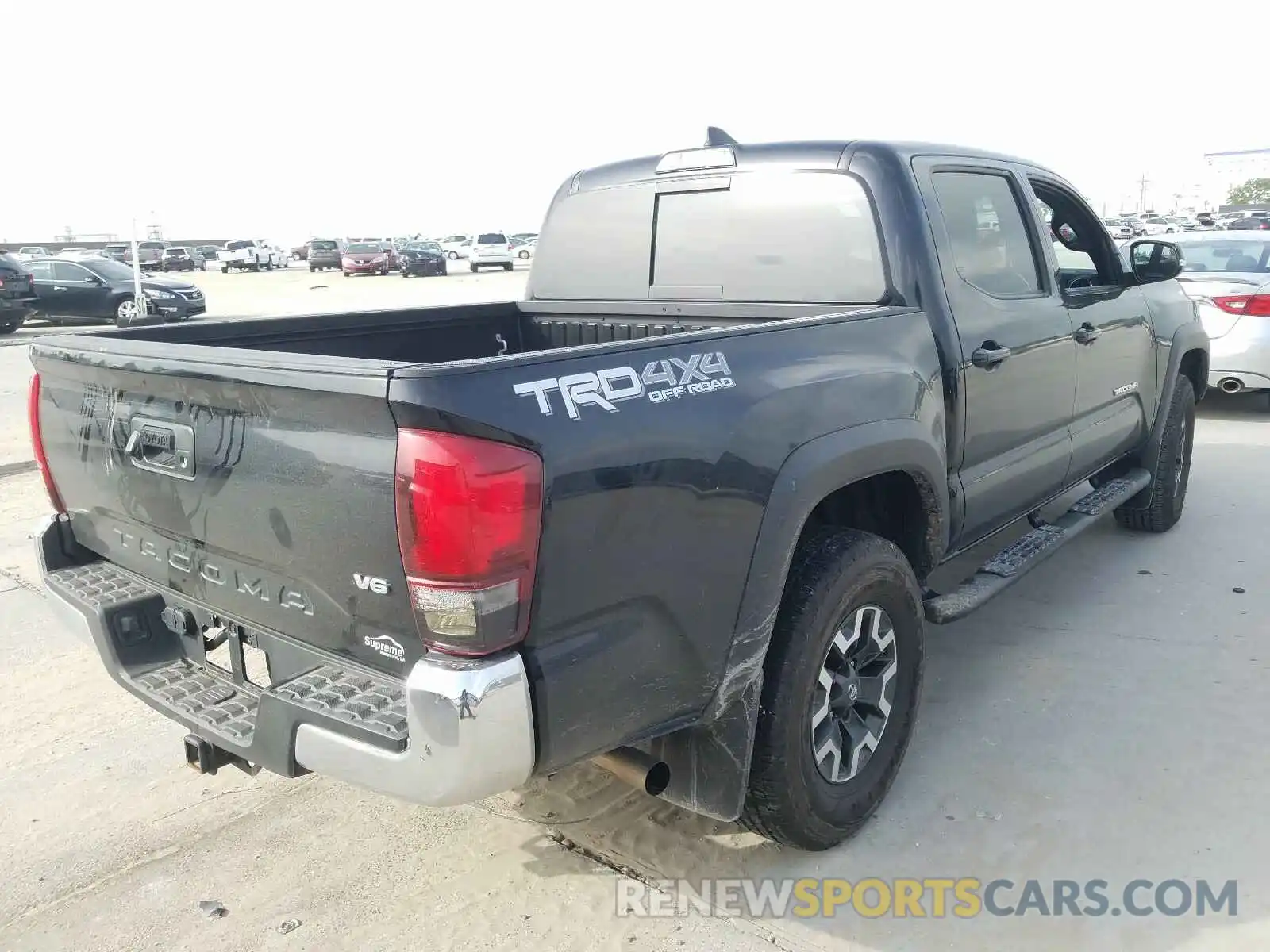 4 Photograph of a damaged car 3TMCZ5AN0KM279752 TOYOTA TACOMA 2019