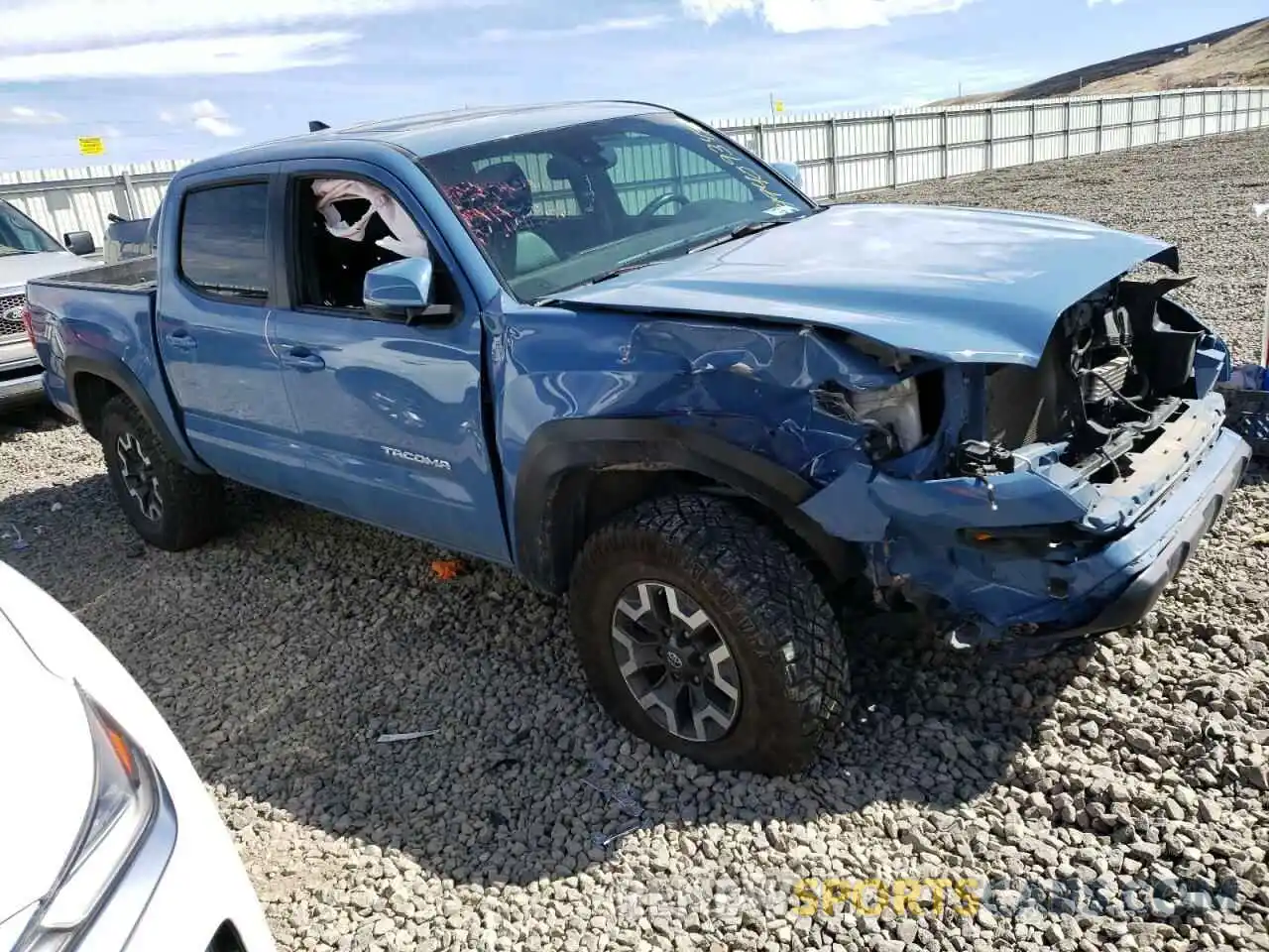 4 Photograph of a damaged car 3TMCZ5AN0KM280609 TOYOTA TACOMA 2019