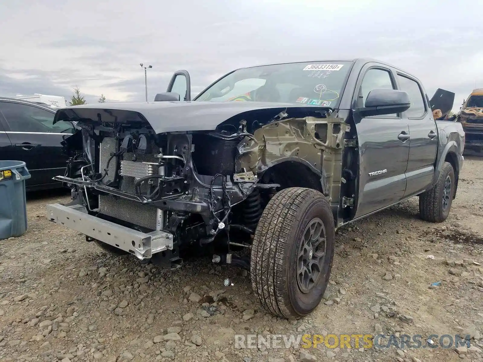 2 Photograph of a damaged car 3TMCZ5AN0KM281033 TOYOTA TACOMA 2019