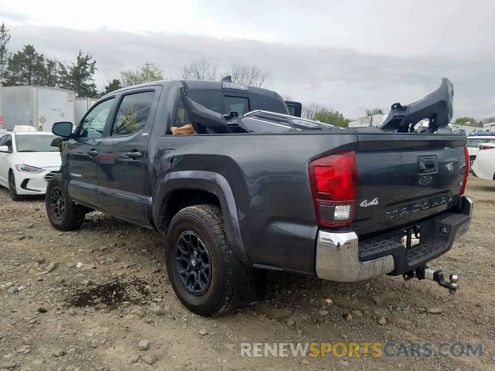 3 Photograph of a damaged car 3TMCZ5AN0KM281033 TOYOTA TACOMA 2019