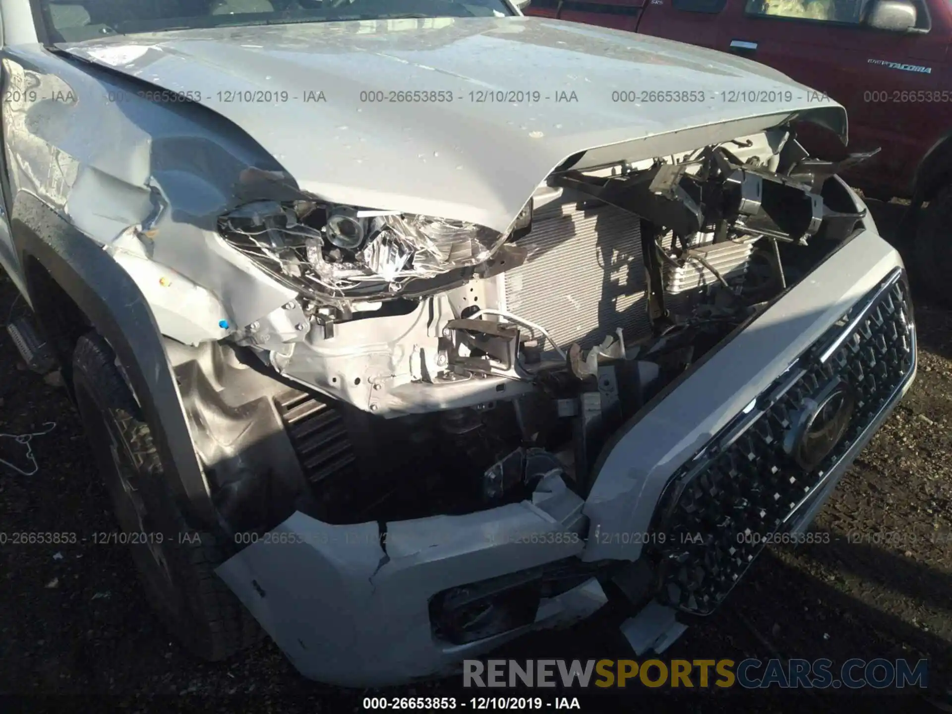 6 Photograph of a damaged car 3TMCZ5AN0KM282988 TOYOTA TACOMA 2019