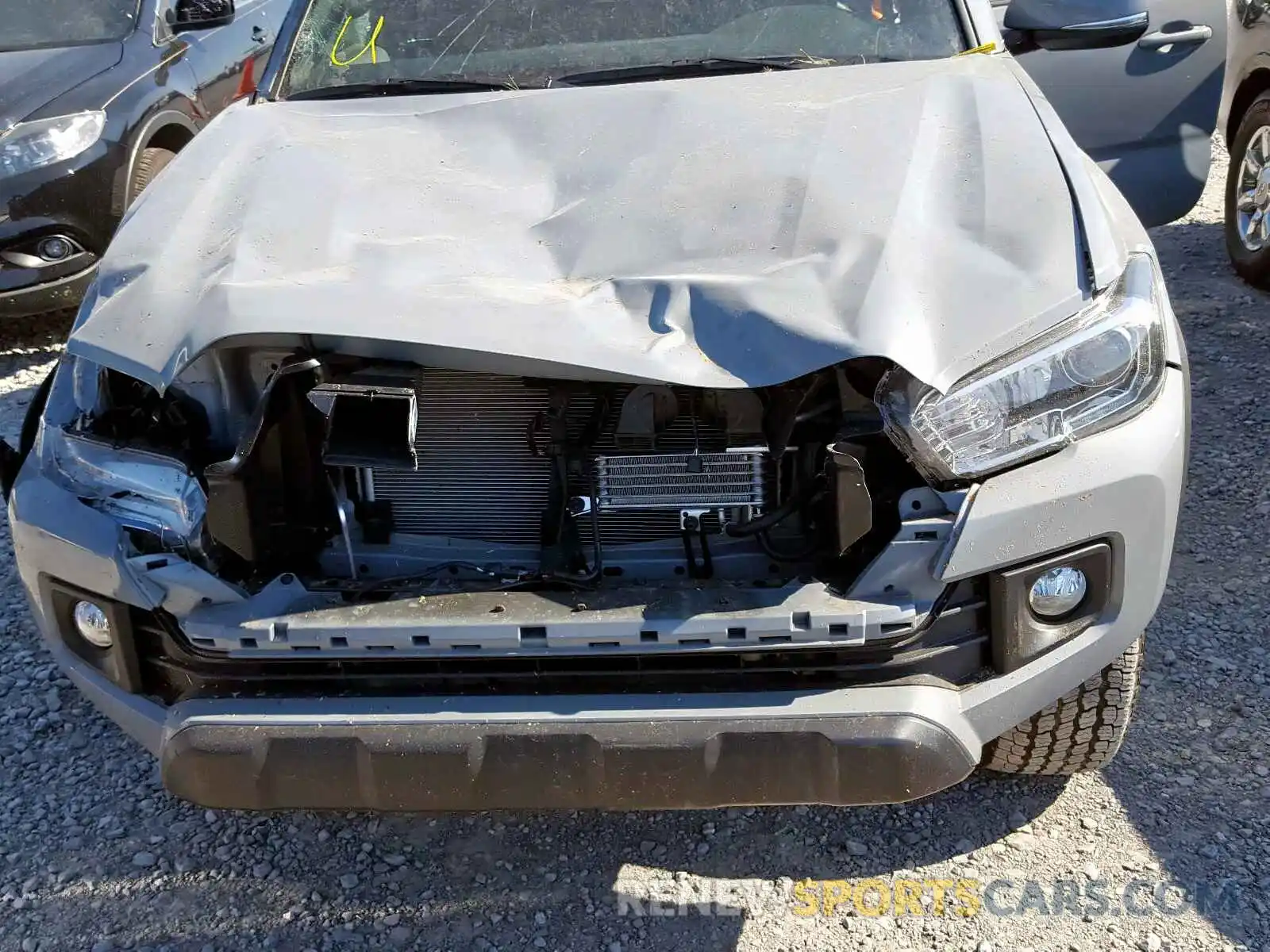 7 Photograph of a damaged car 3TMCZ5AN0KM283087 TOYOTA TACOMA 2019