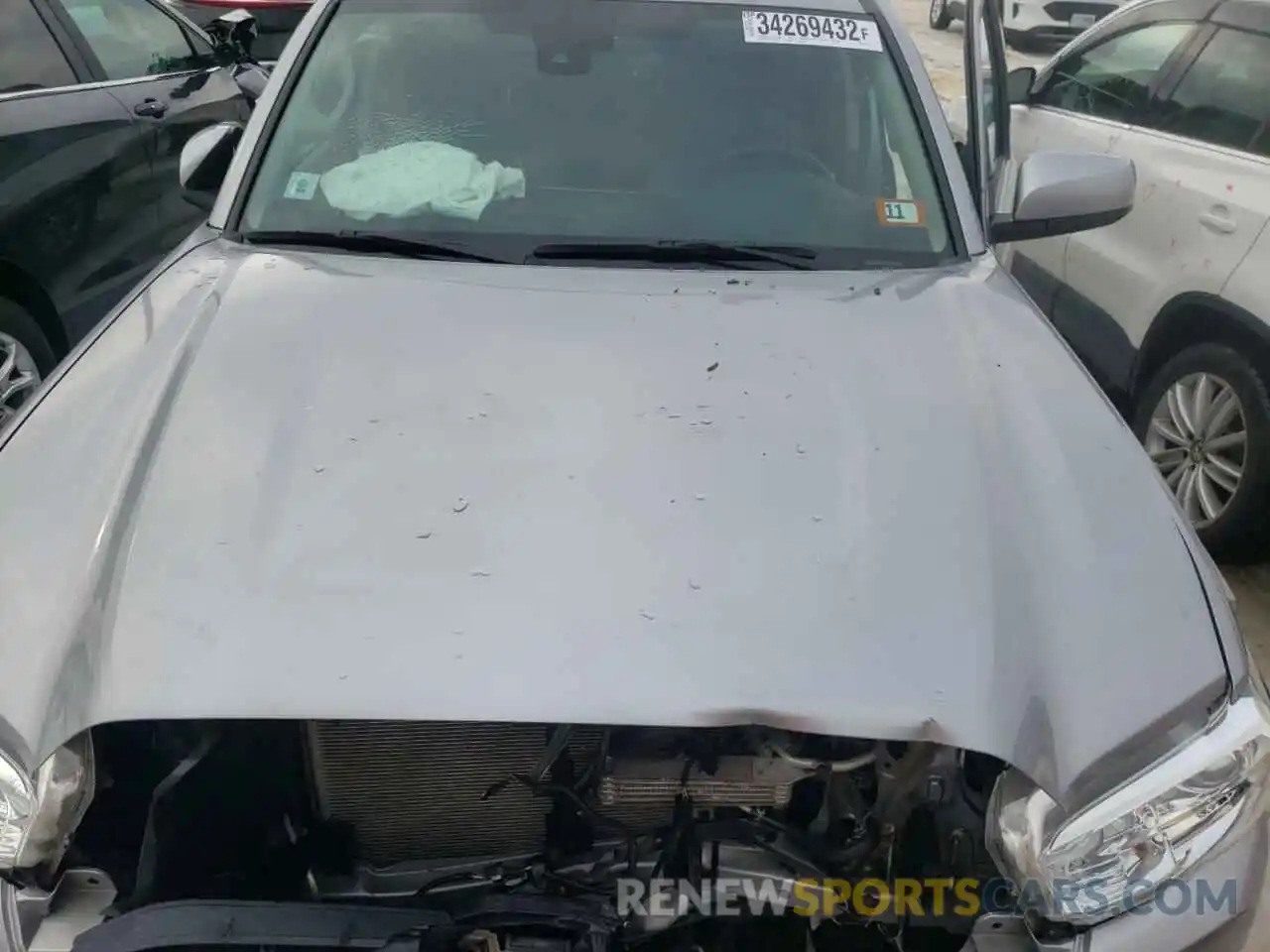 7 Photograph of a damaged car 3TMCZ5AN0KM286278 TOYOTA TACOMA 2019