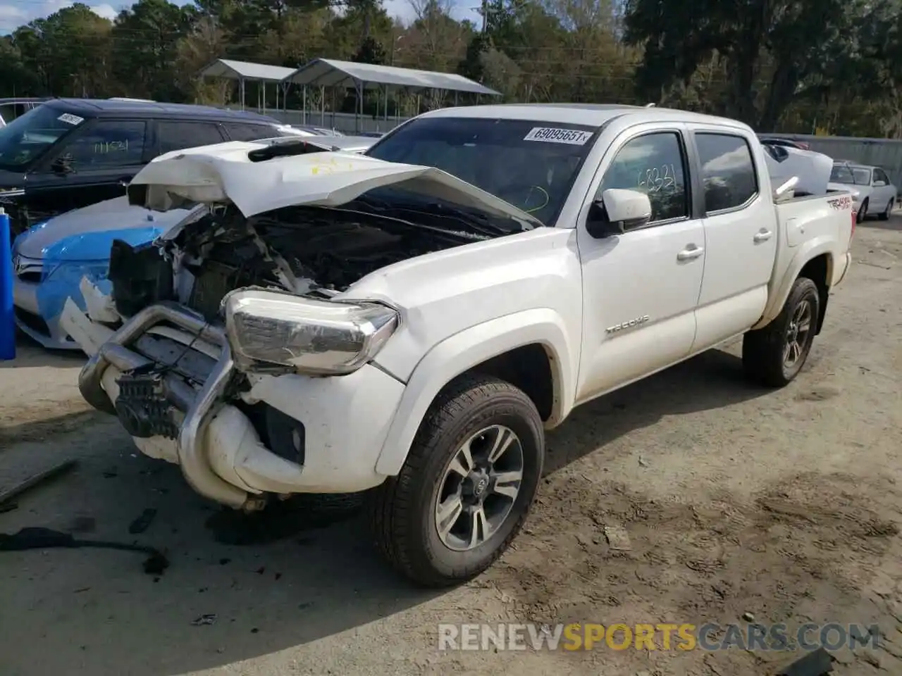 2 Photograph of a damaged car 3TMCZ5AN1KM191017 TOYOTA TACOMA 2019