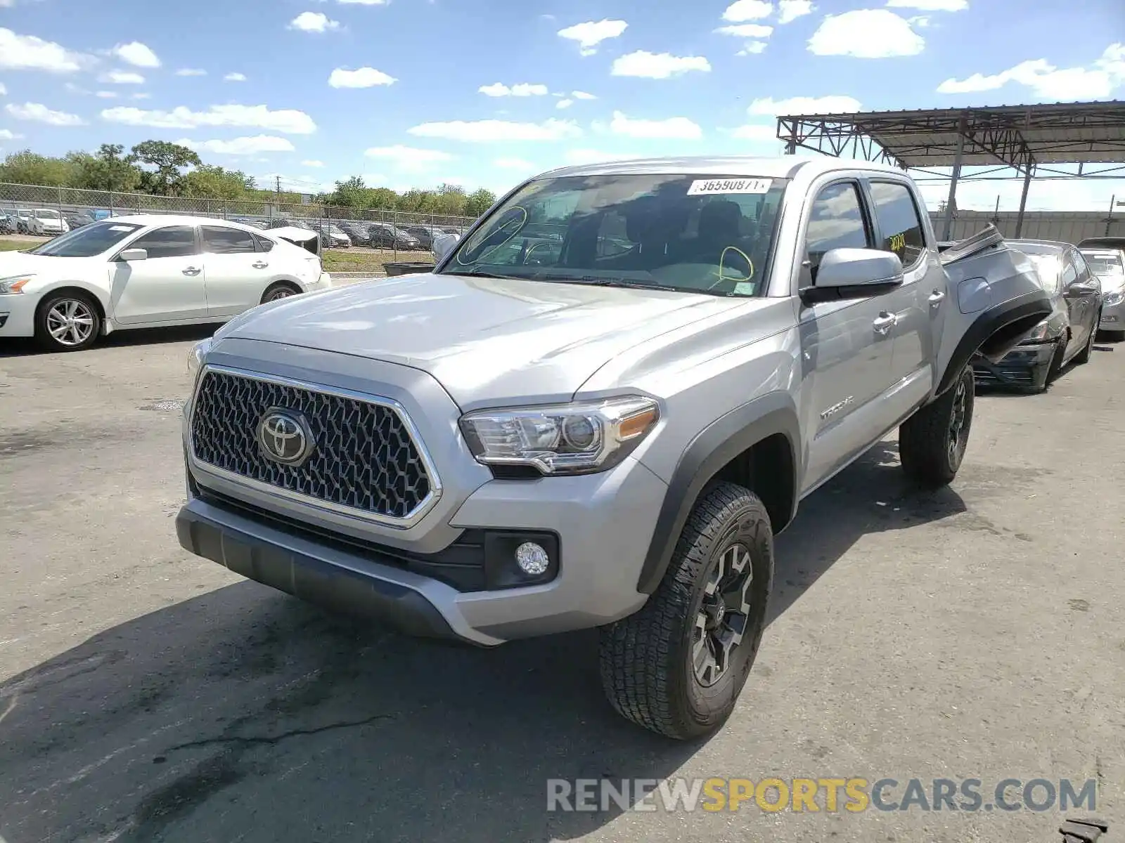 2 Photograph of a damaged car 3TMCZ5AN1KM198288 TOYOTA TACOMA 2019