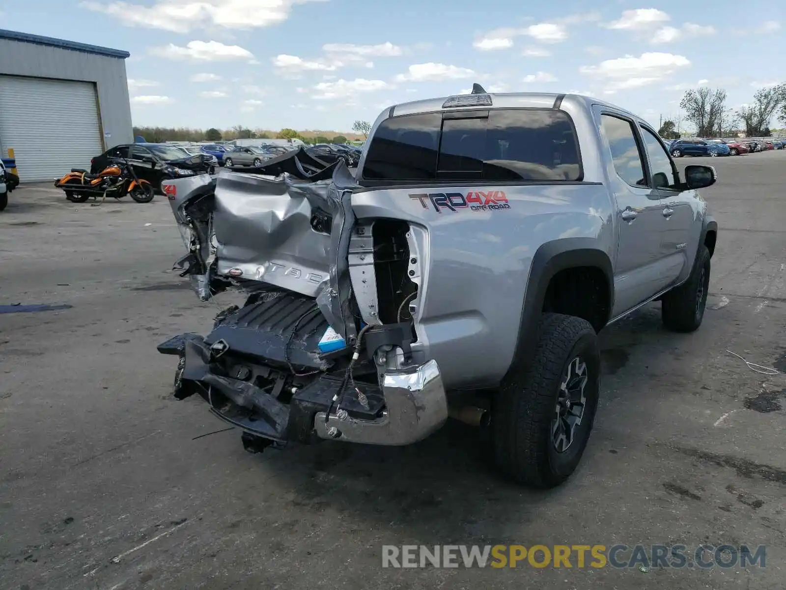 4 Photograph of a damaged car 3TMCZ5AN1KM198288 TOYOTA TACOMA 2019