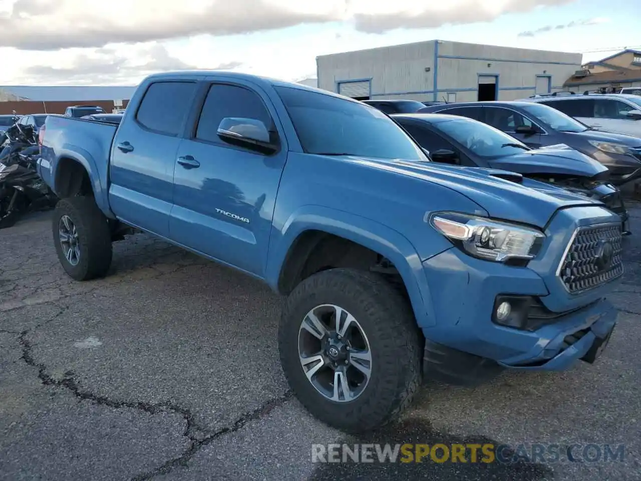 4 Photograph of a damaged car 3TMCZ5AN1KM202162 TOYOTA TACOMA 2019