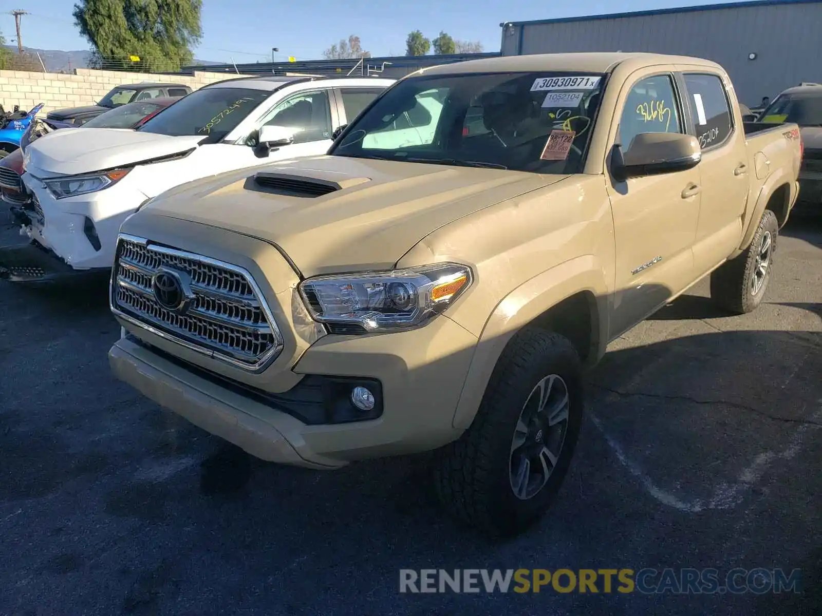 2 Photograph of a damaged car 3TMCZ5AN1KM203506 TOYOTA TACOMA 2019