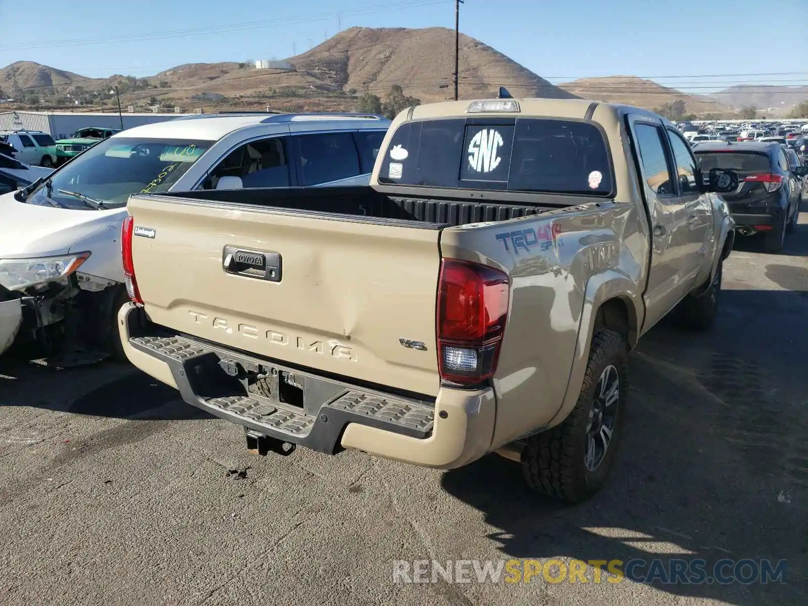 4 Photograph of a damaged car 3TMCZ5AN1KM203506 TOYOTA TACOMA 2019