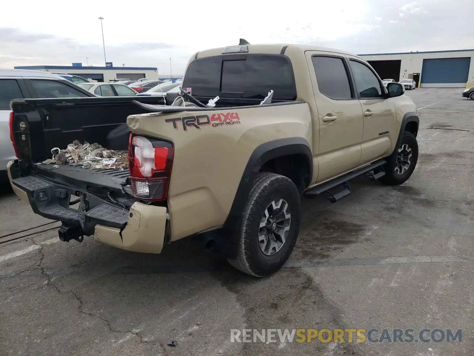 4 Photograph of a damaged car 3TMCZ5AN1KM203585 TOYOTA TACOMA 2019