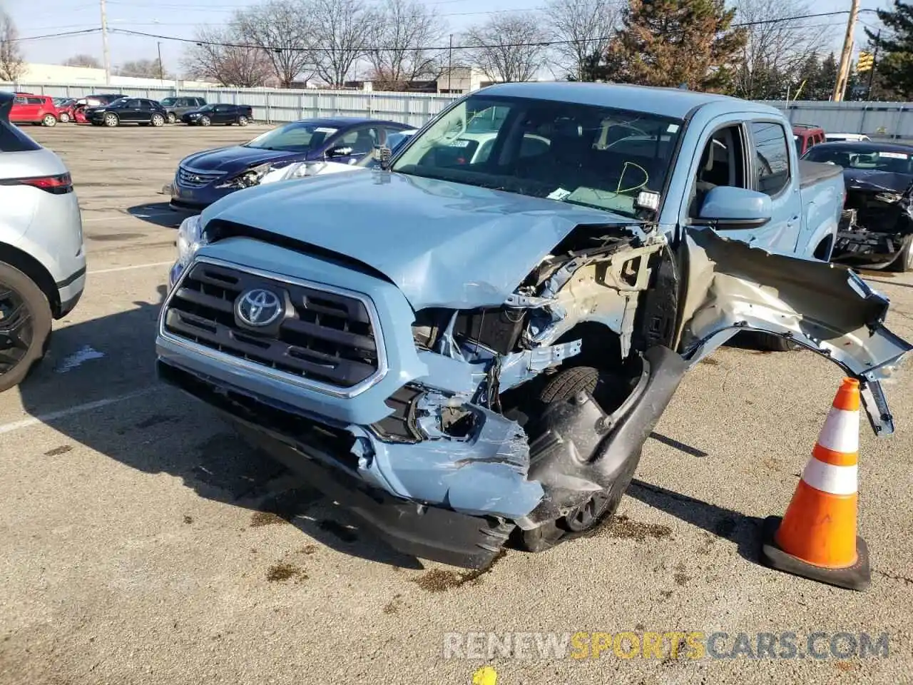 2 Photograph of a damaged car 3TMCZ5AN1KM205692 TOYOTA TACOMA 2019