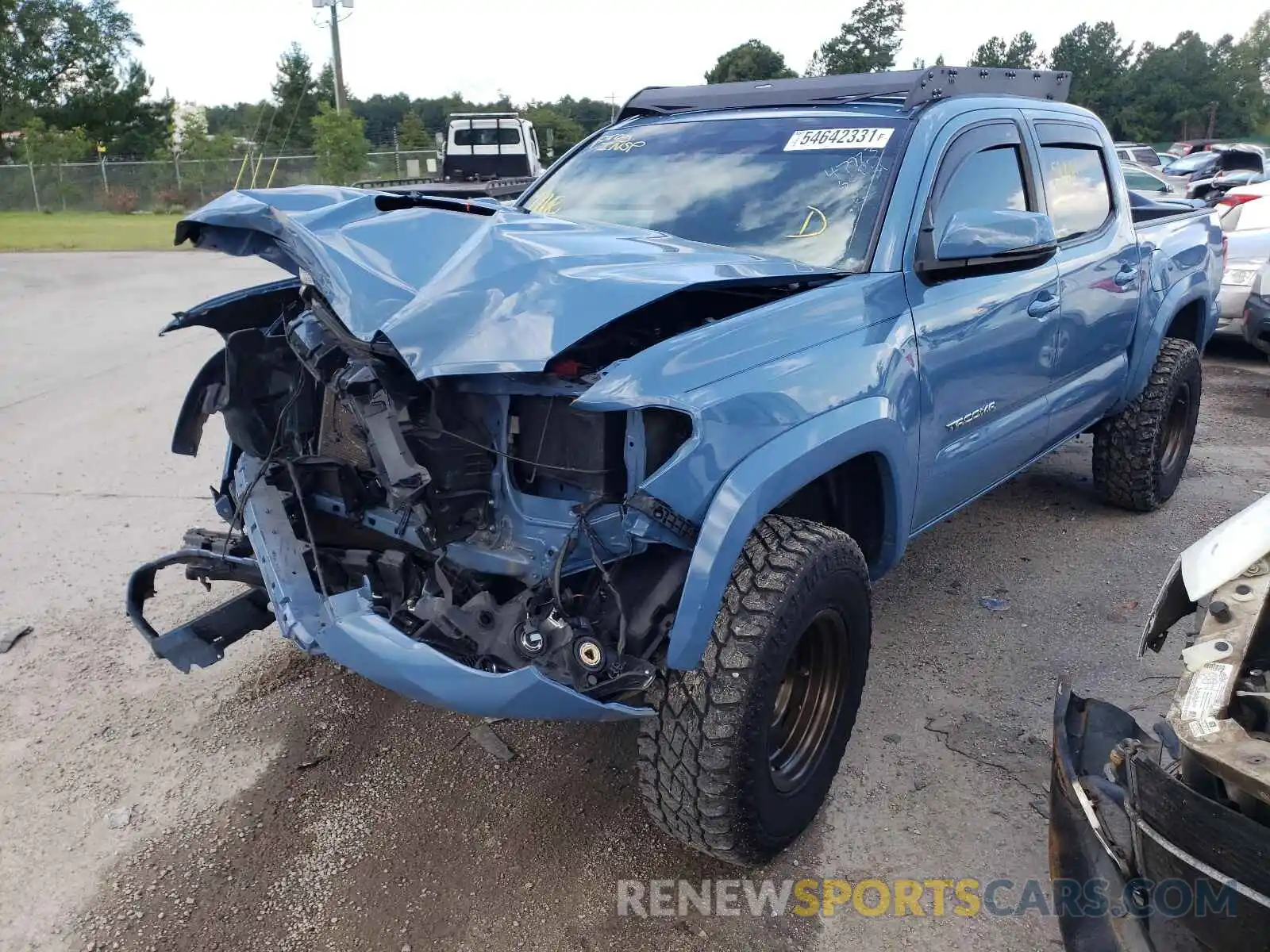 2 Photograph of a damaged car 3TMCZ5AN1KM208964 TOYOTA TACOMA 2019