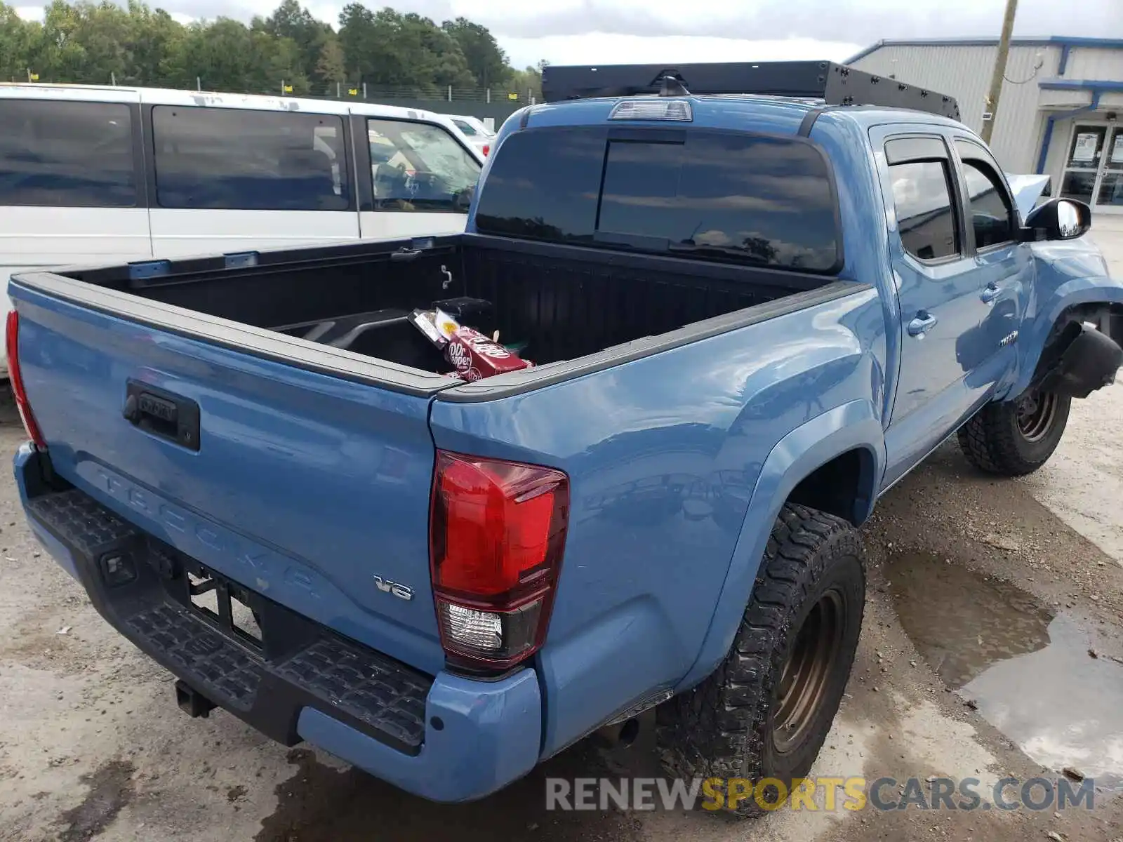 4 Photograph of a damaged car 3TMCZ5AN1KM208964 TOYOTA TACOMA 2019