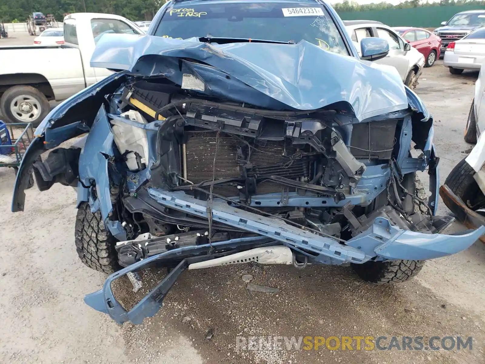 9 Photograph of a damaged car 3TMCZ5AN1KM208964 TOYOTA TACOMA 2019