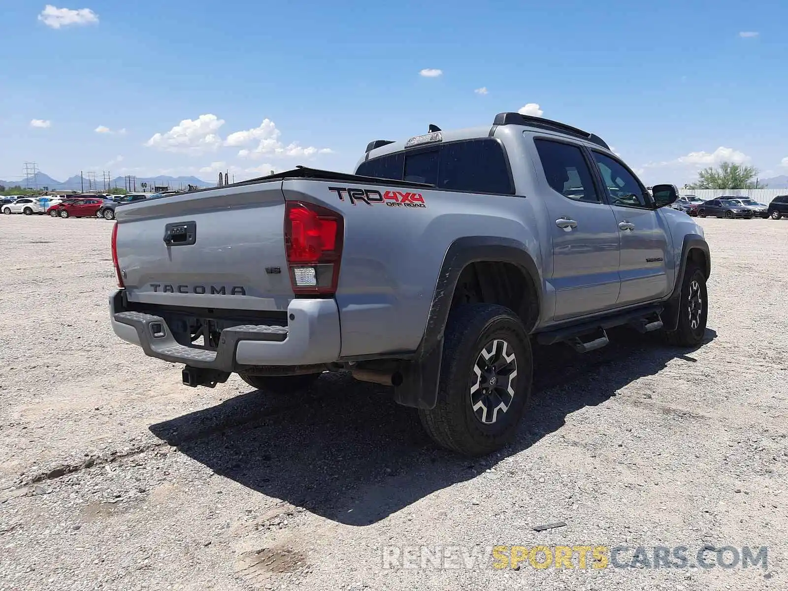 4 Photograph of a damaged car 3TMCZ5AN1KM209225 TOYOTA TACOMA 2019