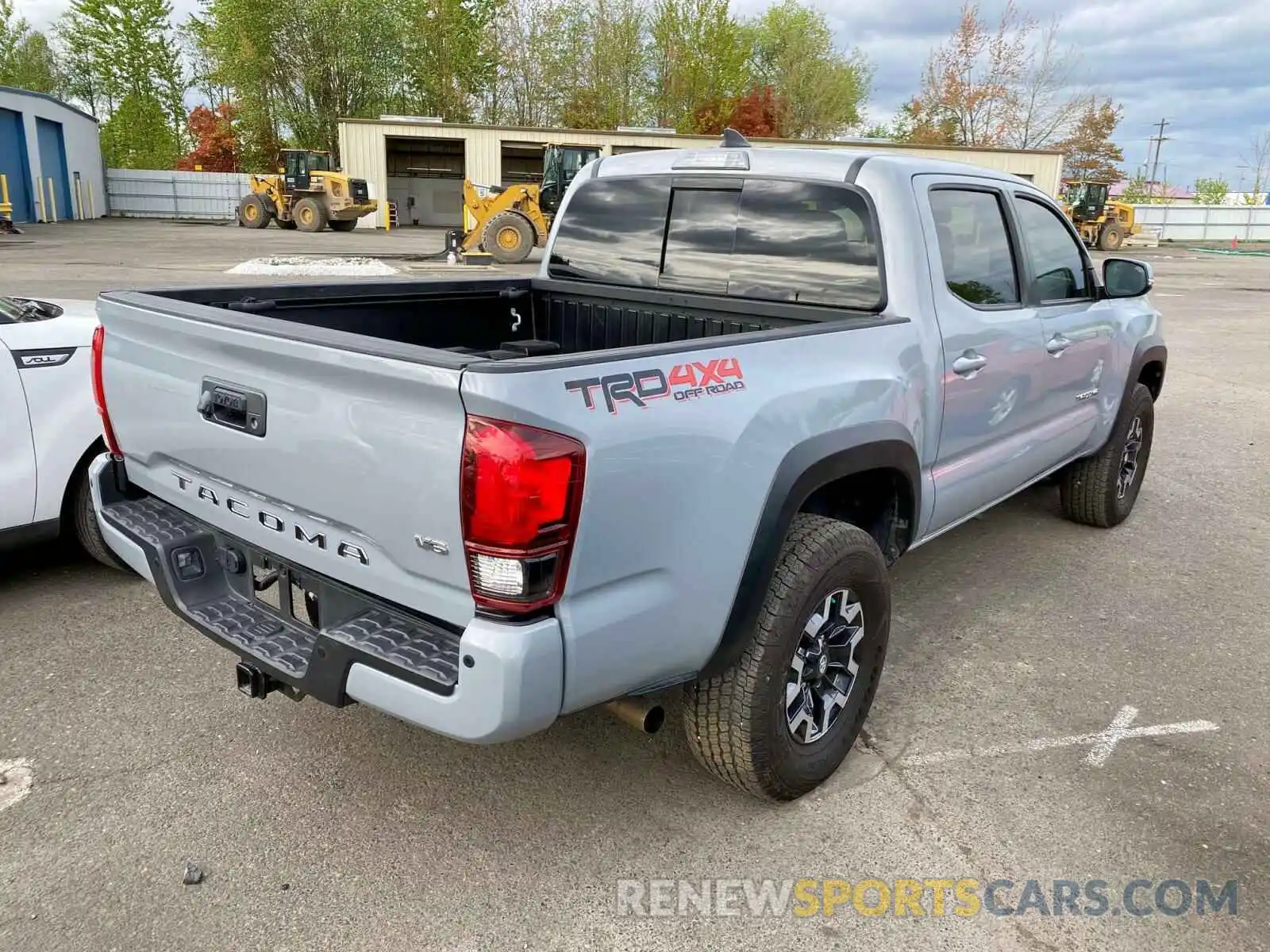 4 Photograph of a damaged car 3TMCZ5AN1KM209743 TOYOTA TACOMA 2019