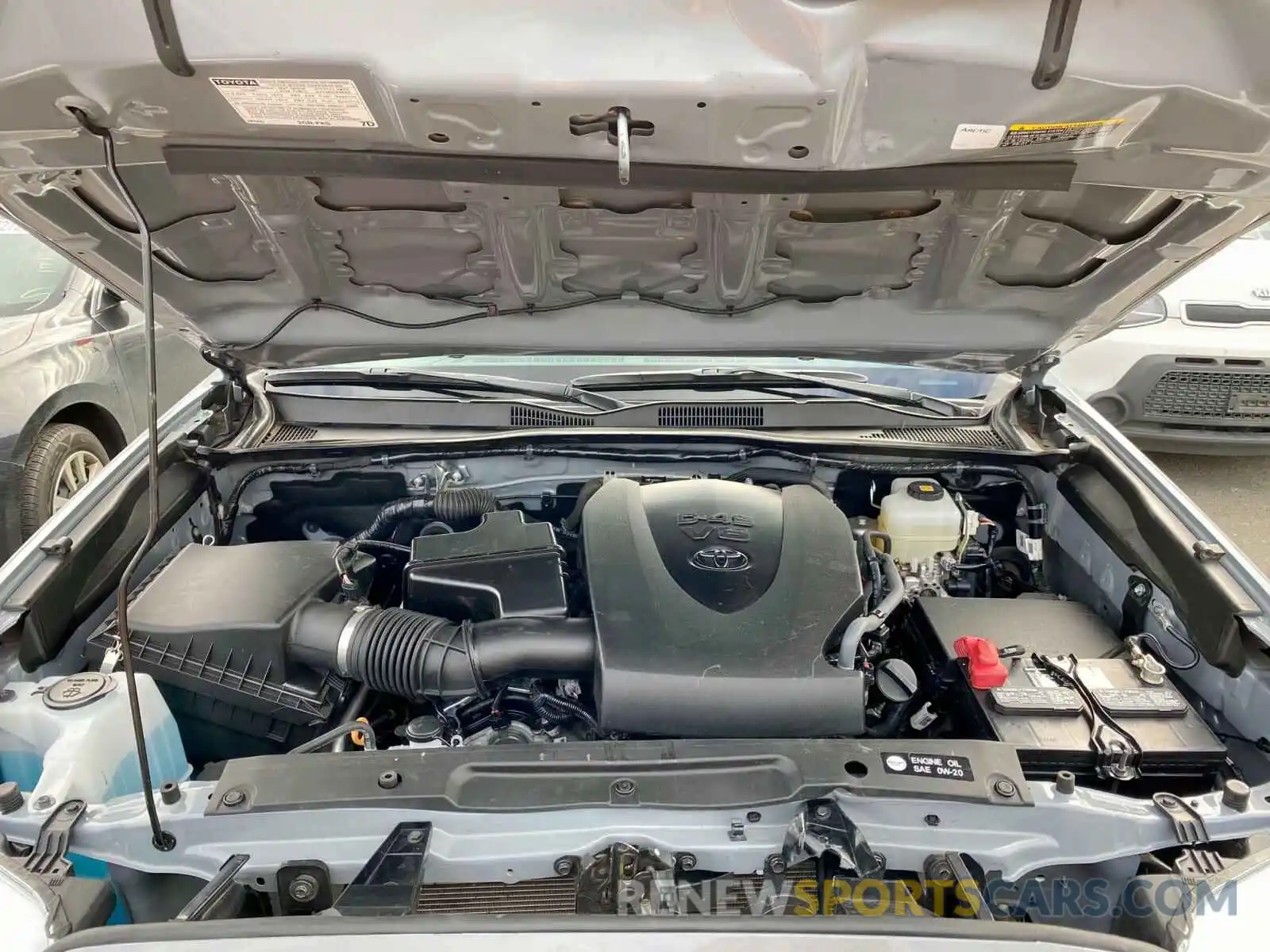 7 Photograph of a damaged car 3TMCZ5AN1KM209743 TOYOTA TACOMA 2019