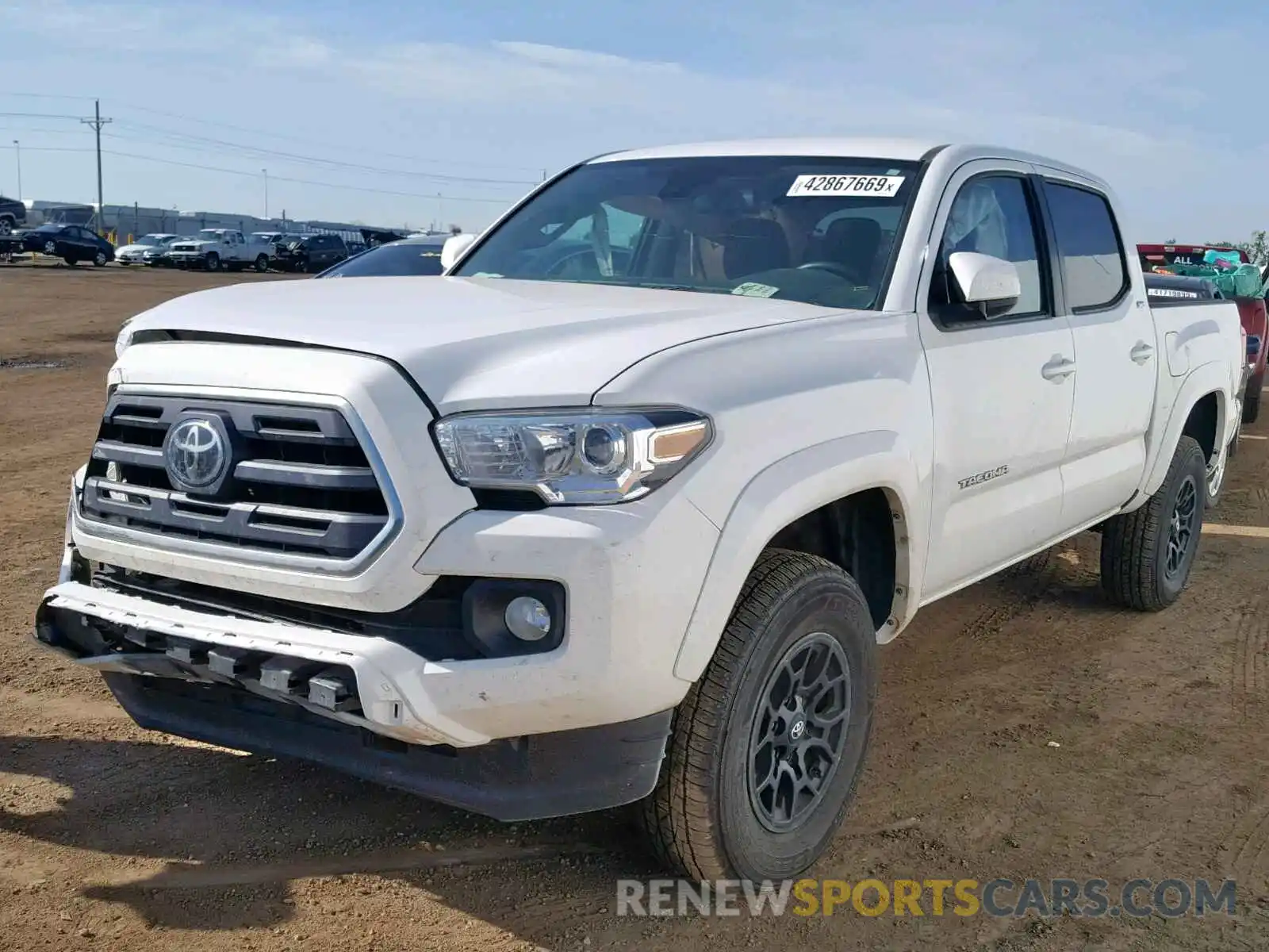 2 Photograph of a damaged car 3TMCZ5AN1KM211122 TOYOTA TACOMA 2019