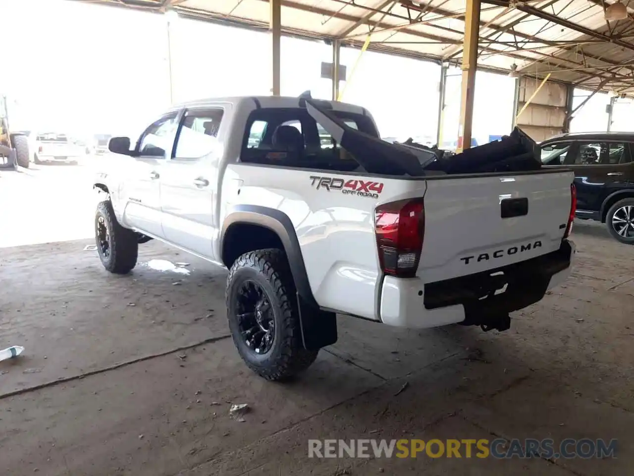 3 Photograph of a damaged car 3TMCZ5AN1KM214215 TOYOTA TACOMA 2019