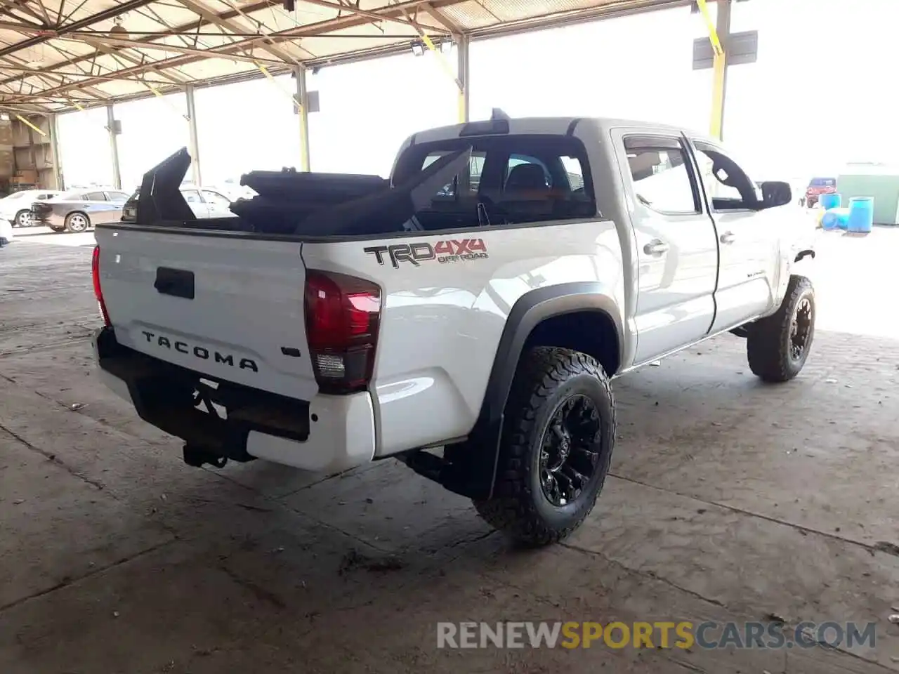 4 Photograph of a damaged car 3TMCZ5AN1KM214215 TOYOTA TACOMA 2019