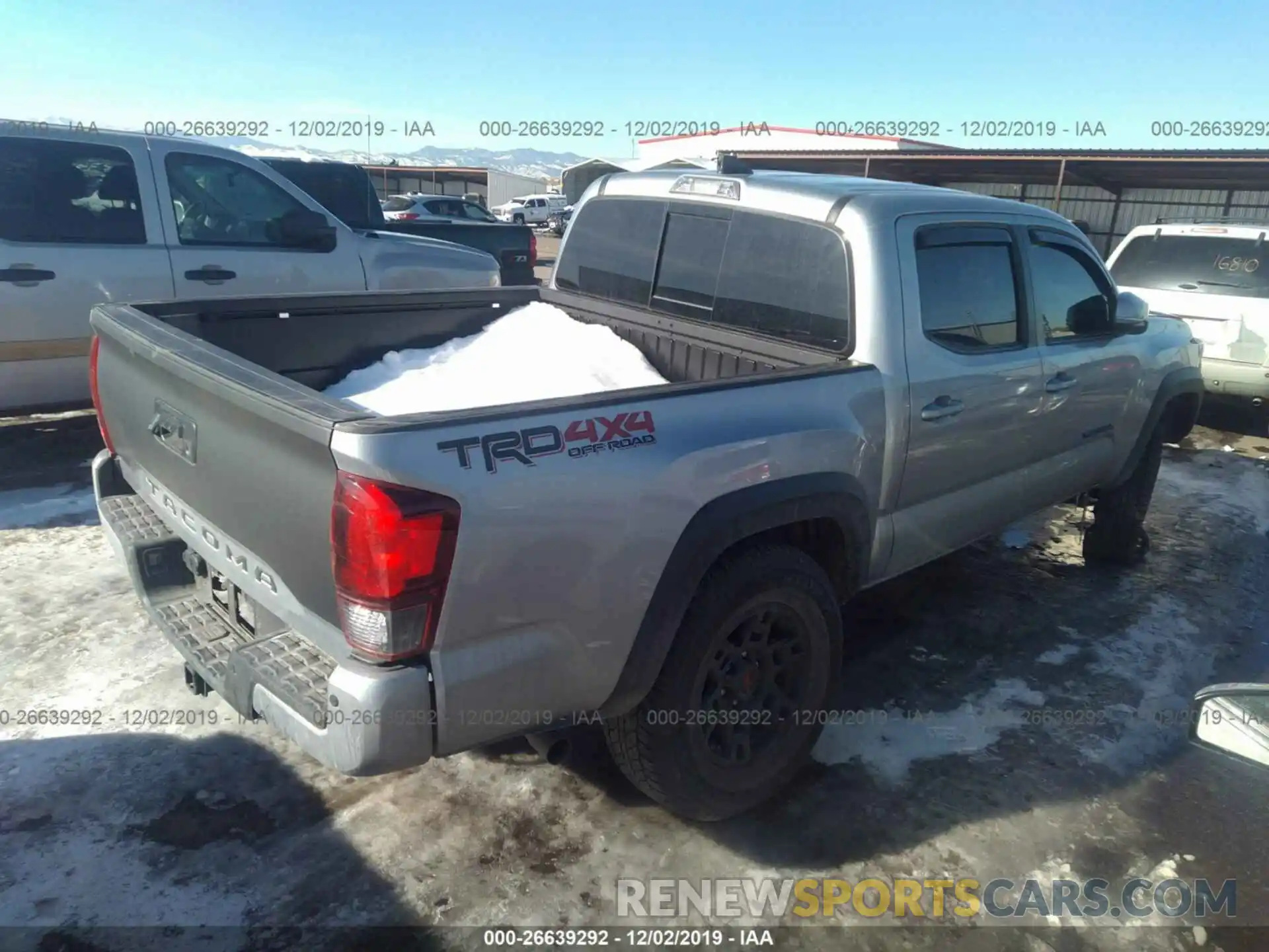 4 Photograph of a damaged car 3TMCZ5AN1KM218703 TOYOTA TACOMA 2019