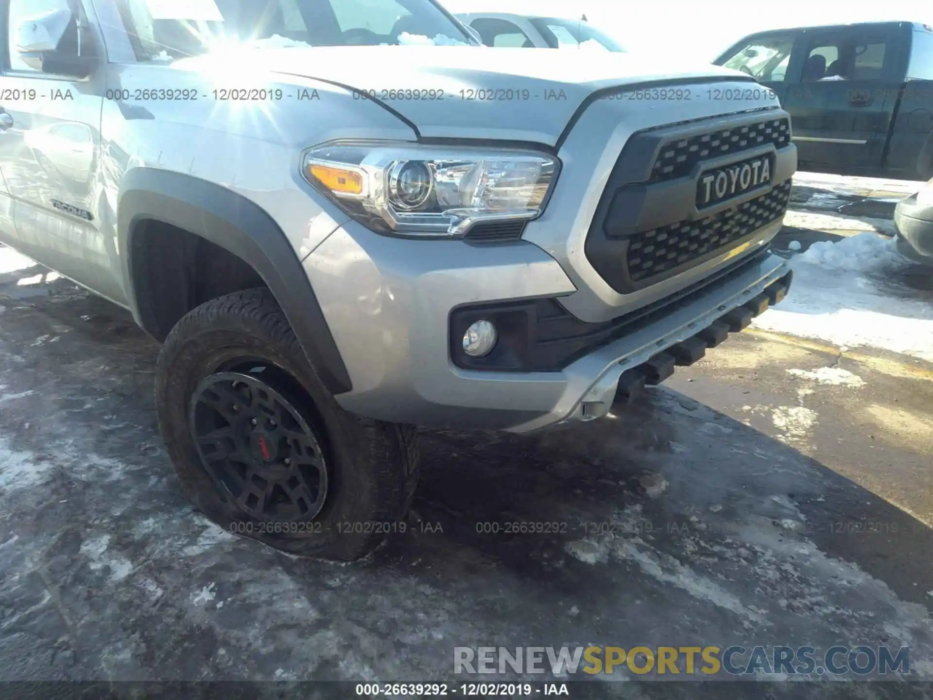 6 Photograph of a damaged car 3TMCZ5AN1KM218703 TOYOTA TACOMA 2019