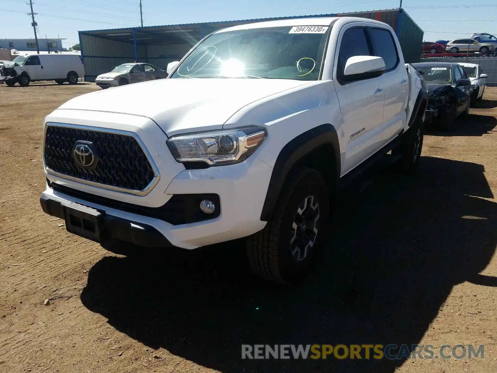 2 Photograph of a damaged car 3TMCZ5AN1KM219334 TOYOTA TACOMA 2019