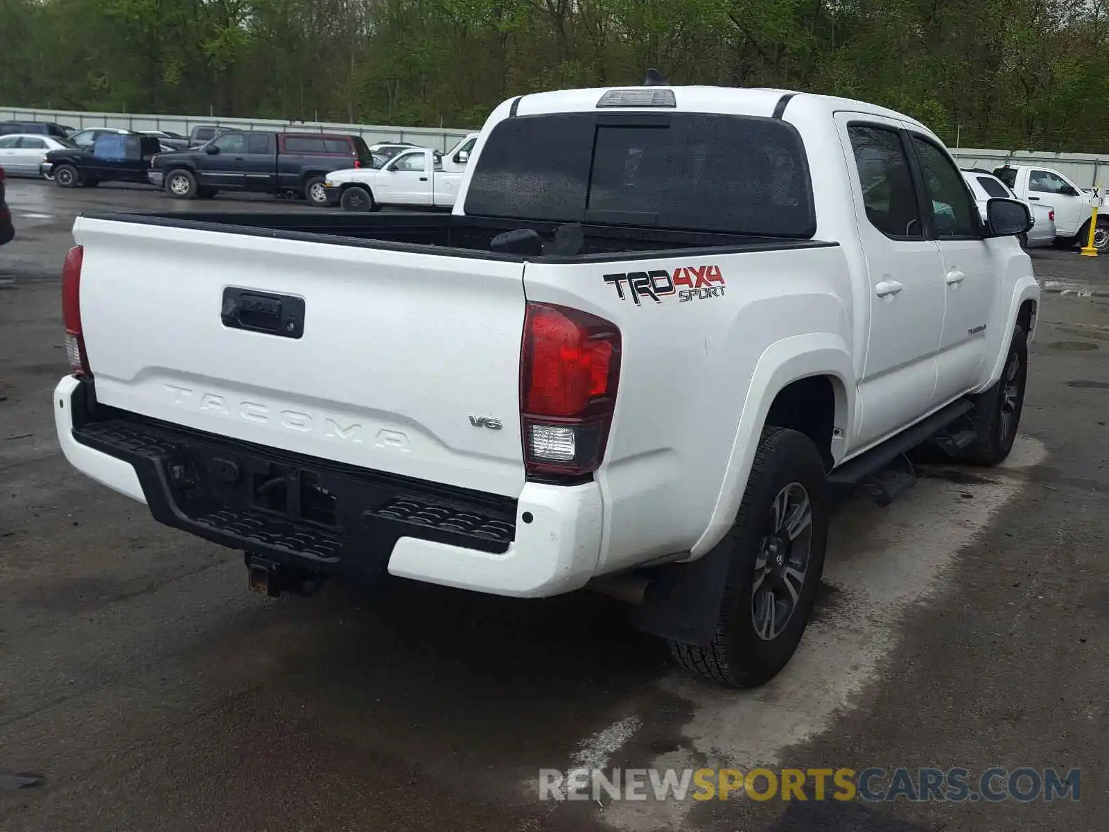 4 Photograph of a damaged car 3TMCZ5AN1KM219771 TOYOTA TACOMA 2019