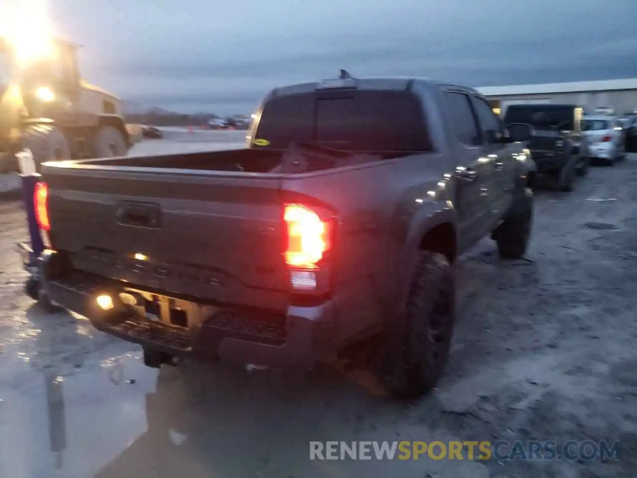 4 Photograph of a damaged car 3TMCZ5AN1KM222587 TOYOTA TACOMA 2019