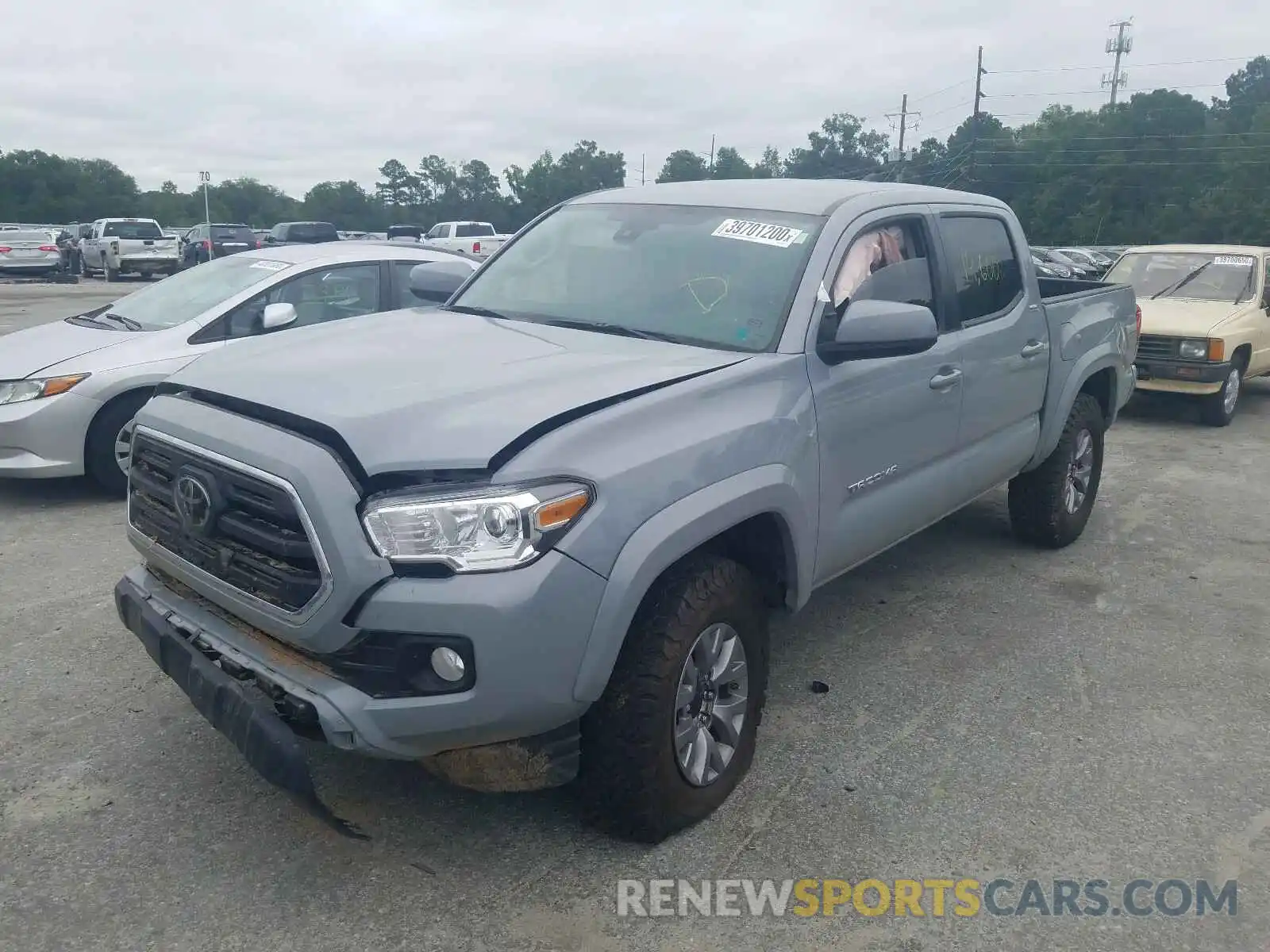 2 Photograph of a damaged car 3TMCZ5AN1KM223626 TOYOTA TACOMA 2019