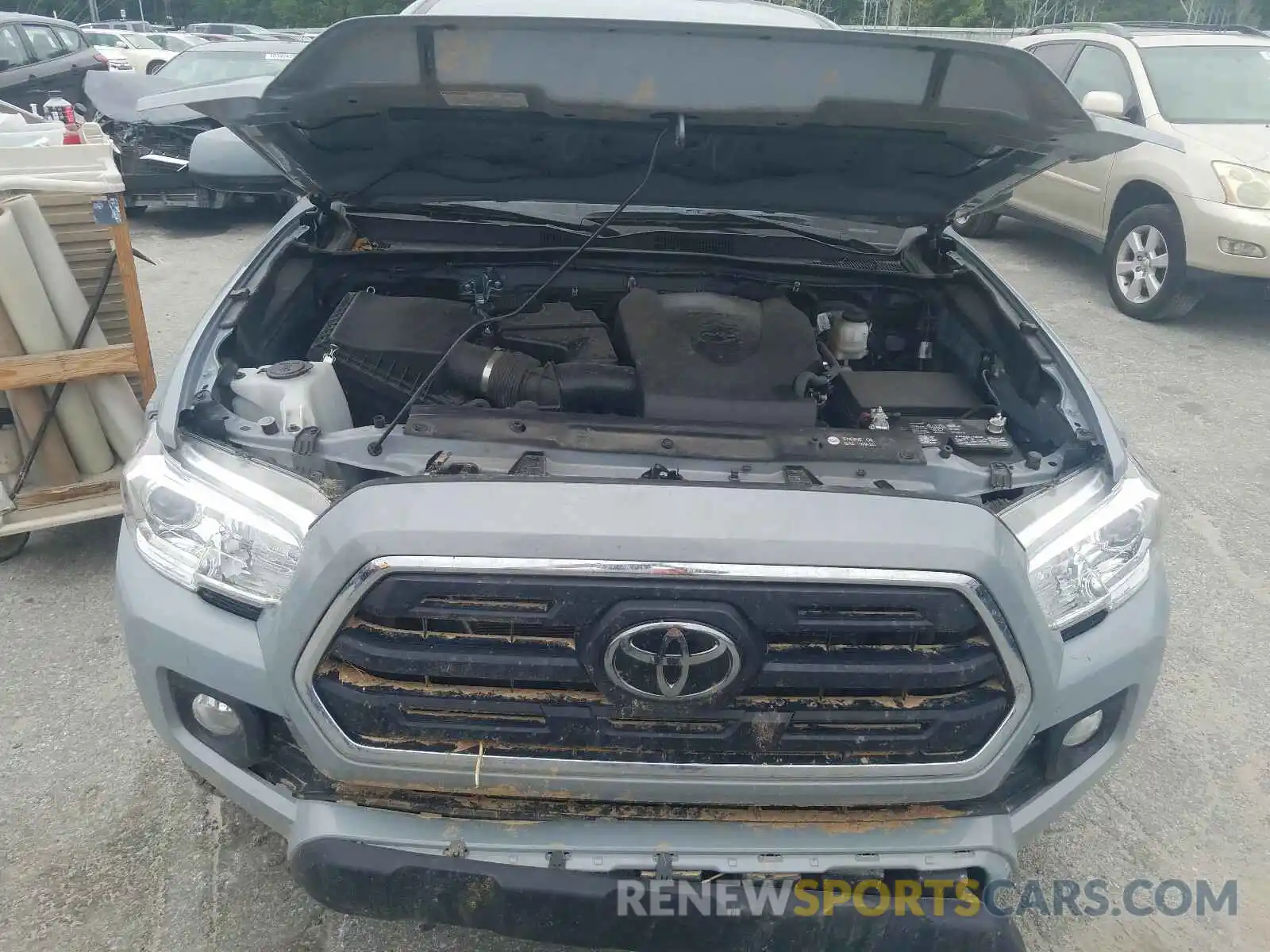 7 Photograph of a damaged car 3TMCZ5AN1KM223626 TOYOTA TACOMA 2019