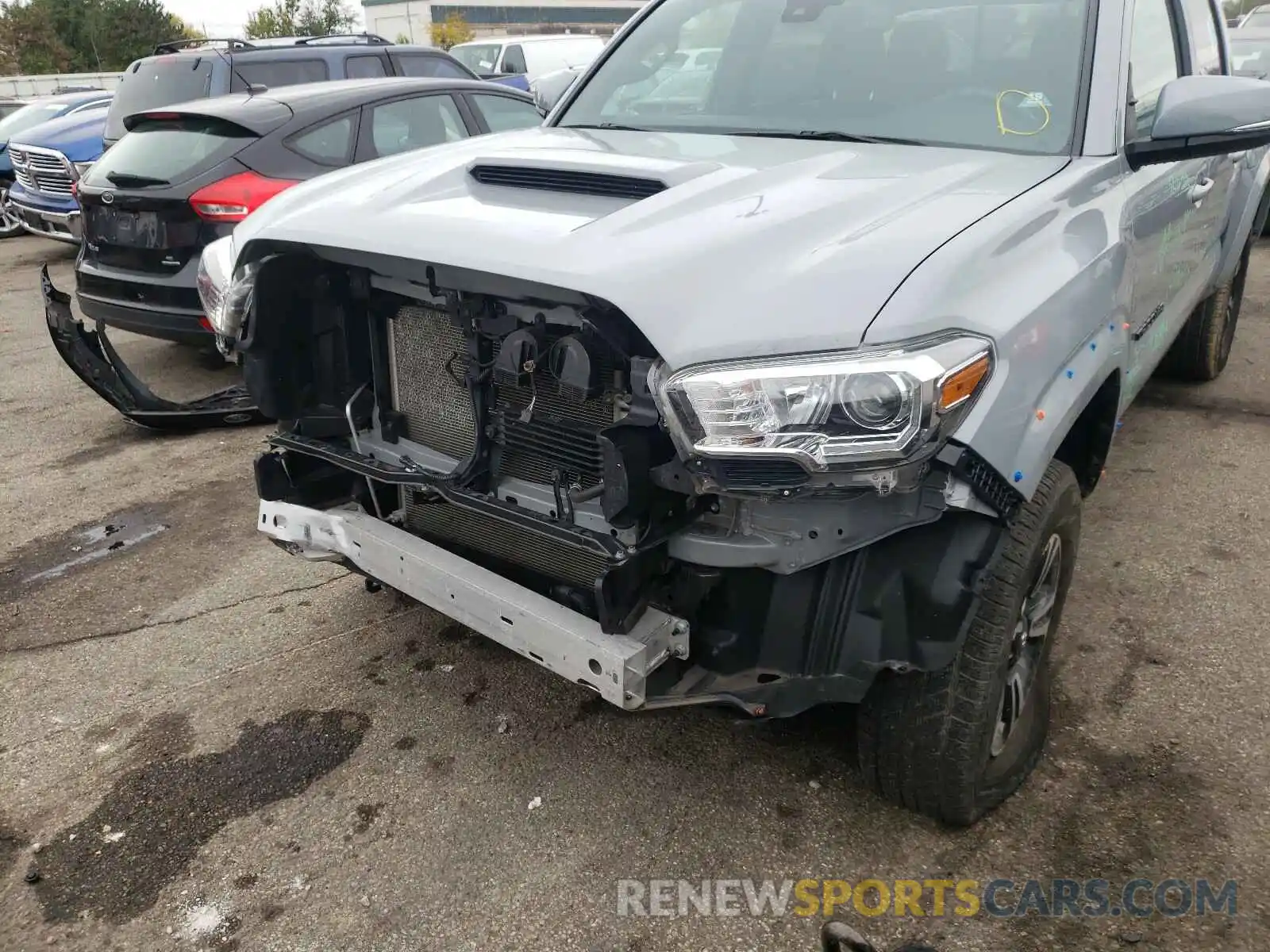 9 Photograph of a damaged car 3TMCZ5AN1KM230950 TOYOTA TACOMA 2019