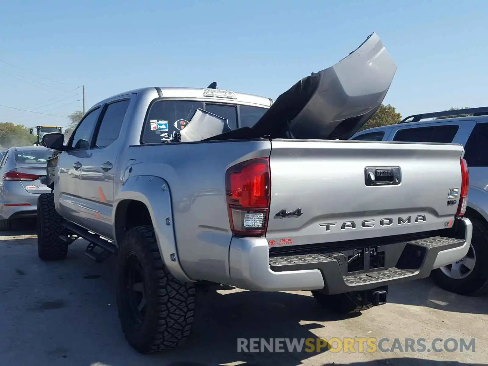 3 Photograph of a damaged car 3TMCZ5AN1KM235758 TOYOTA TACOMA 2019