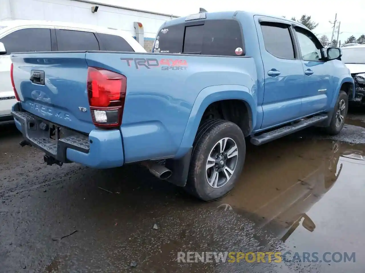 4 Photograph of a damaged car 3TMCZ5AN1KM236666 TOYOTA TACOMA 2019